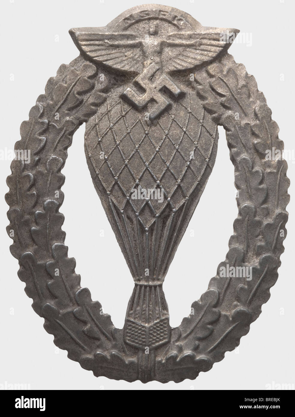 A NSFK Badge for Free Balloon Pilots, issue with winged human figure 1938 - 1945 Fine zinc with vestiges of silvering. Reverse marked '231240', wire attachment pin (OEK 3671). historic, historical, 1930s, 1930s, 20th century, awards, award, German Reich, Third Reich, Nazi era, National Socialism, object, objects, stills, medal, decoration, medals, decorations, clipping, cut out, cut-out, cut-outs, honor, honour, National Socialist, Nazi, Nazi period, symbol, symbols, emblem, emblems, insignia, Stock Photo