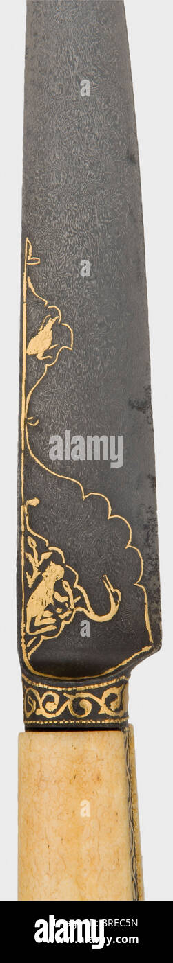 A Persian Kard with gold inlay, circa 1800 A sturdy wootz-Damascus blade with hairline grooves cut on the back. The base of the blade and the grip frame bear gold inlays of floral designs and various animals (minimal damage). Intact crystalline walrus ivory grip scales. Length 33.3 cm. historic, historical, 19th century, Persian Empire, object, objects, stills, clipping, clippings, cut out, cut-out, cut-outs, weapon, arms, weapons, arms, Stock Photo