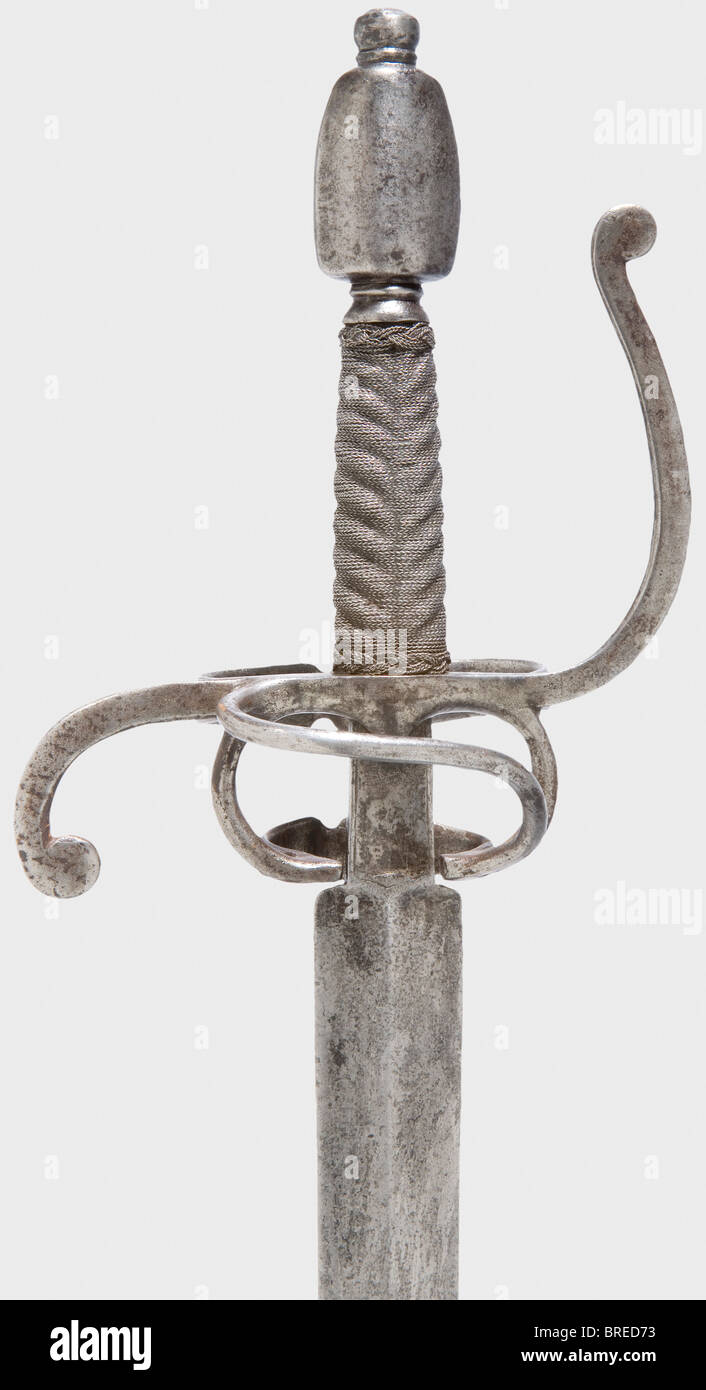 A South German sword, circa 1600 Broad tapering blade of diamond section. An 'S' mark stamped on the obverse side of the ricasso. Iron knuckle-bow hilt with a double guard loop. The grip has fine iron wire winding and Turk's heads. Pommel flatted on the sides. Length 101 cm. historic, historical,, 17th century, sword, swords, weapons, arms, weapon, arm, fighting device, military, militaria, object, objects, stills, clipping, clippings, cut out, cut-out, cut-outs, melee weapon, melee weapons, metal, Stock Photo