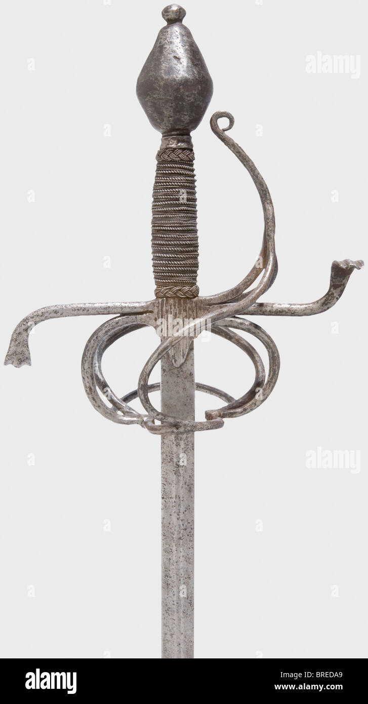 A German rapier, circa 1600 Slender blade of flattened hexagonal sectione, on the obverse ricasso a blossom-shaped mark. Iron swept hilt with S-shaped quillons, wire wound grip with Turk's heads and a heavy, double-conical pommel. Length 129 cm. historic, historical,, 17th century, sword, swords, weapons, arms, weapon, arm, fighting device, military, militaria, object, objects, stills, clipping, clippings, cut out, cut-out, cut-outs, melee weapon, melee weapons, metal, Stock Photo