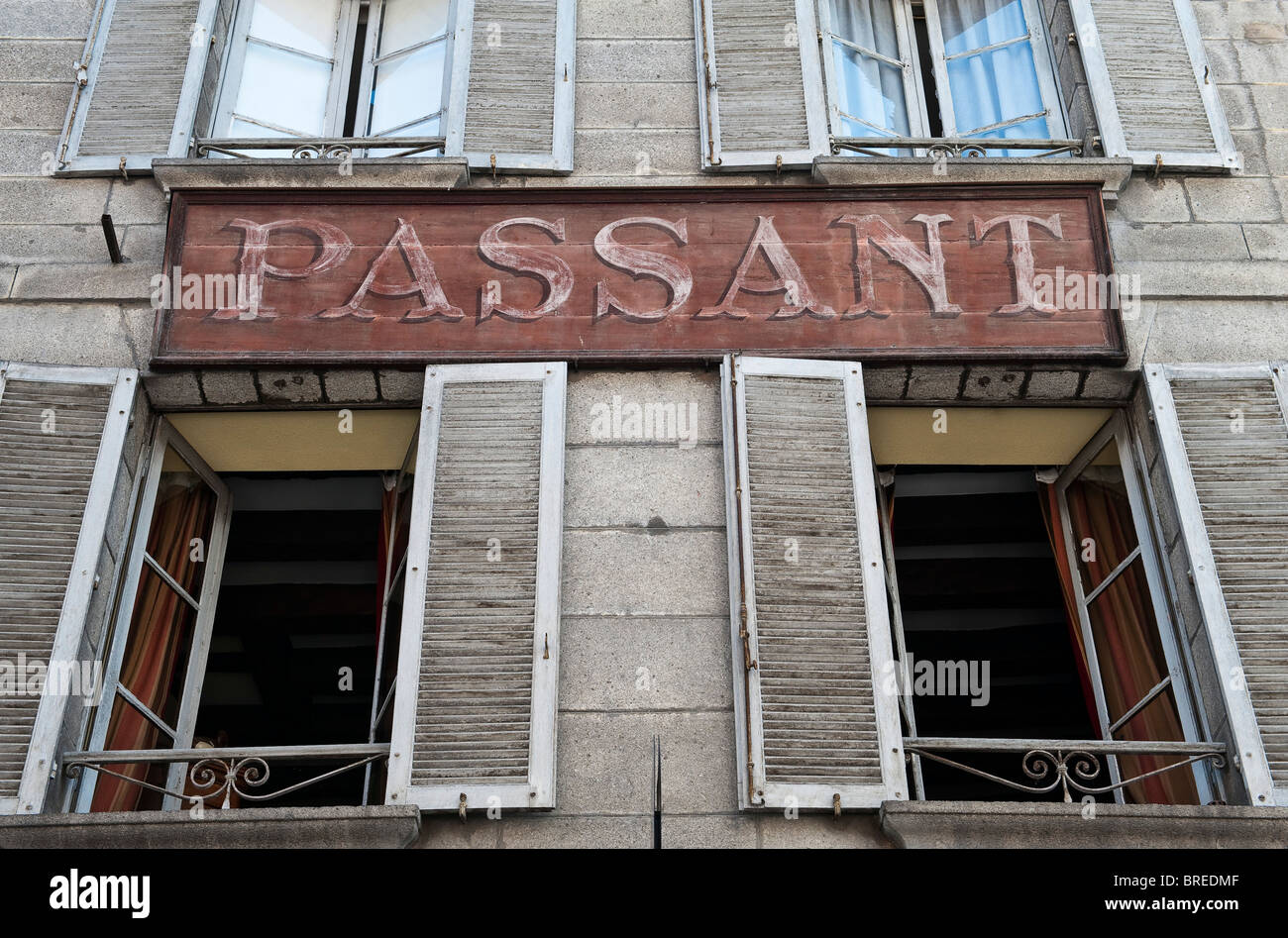 Aubusson, France. An old shop front with shuttered windows Stock Photo