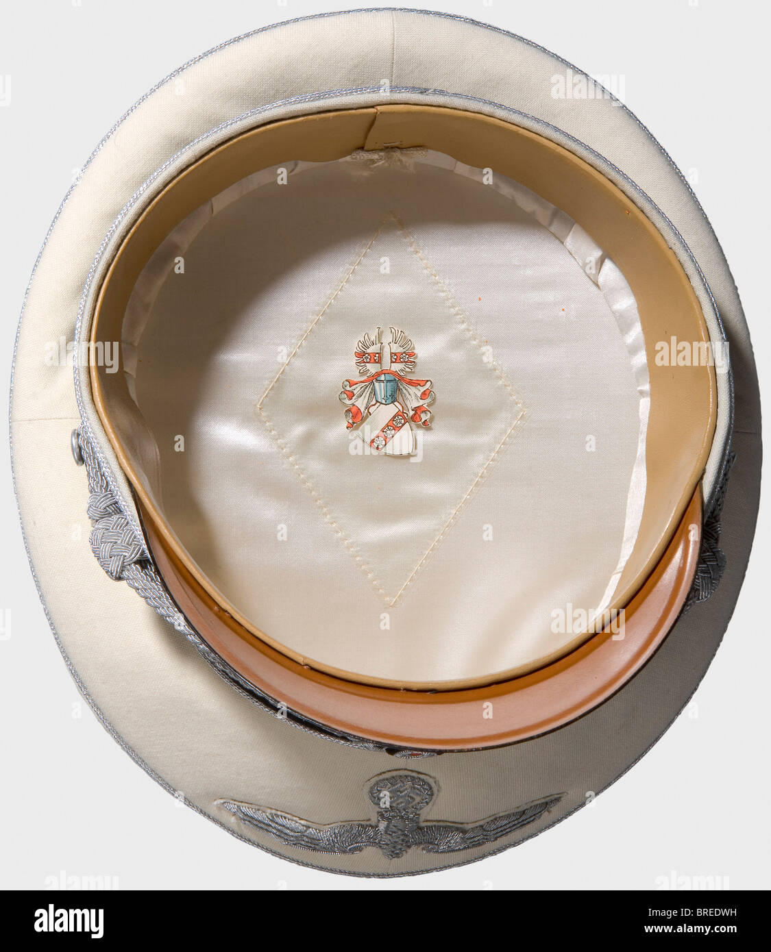 Franz von Papen (1879 - 1969), a summer service cap for the diplomat's uniform Fine, white linen with black cap band and silver piping, silver-embroidered party eagle on white backing, silver-embroidered cap wreath on black backing, and a silver cap cord. Cream-coloured silk lining with the von Papen family coat of arms on the inside label. Insignia are slightly oxidized. In 1932, Franz von Papen was appointed Reich's Chancellor by the Reich's President Paul von Hindenburg, during 1933 - 1934, he was vice-chancellor in Hitler's cabinet, as ambassador, he played, Stock Photo
