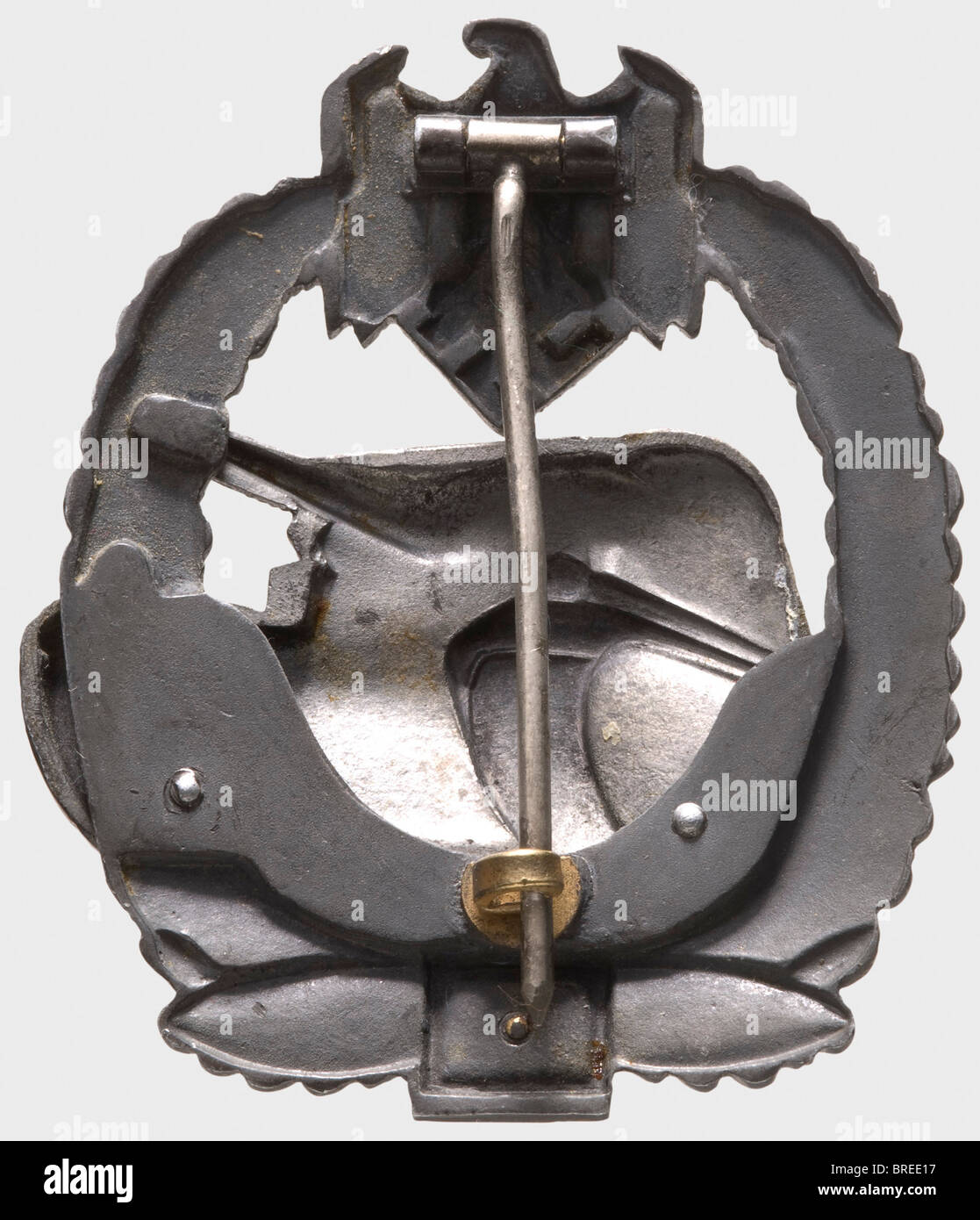An Army Tank Assault Badge in Silver, Grade IV for 75 engagements Two-piece version of fine zinc with riveted zinc tank and separately inset engagements number. Wire pin. The gilding of the oak leaf wreath is completely migrated. Weight 31.40 g (OEK 3898). historic, historical, 1930s, 1930s, 20th century, awards, award, German Reich, Third Reich, Nazi era, National Socialism, object, objects, stills, medal, decoration, medals, decorations, clipping, cut out, cut-out, cut-outs, honor, honour, National Socialist, Nazi, Nazi period, symbol, symbols, emblem, emblem, Stock Photo