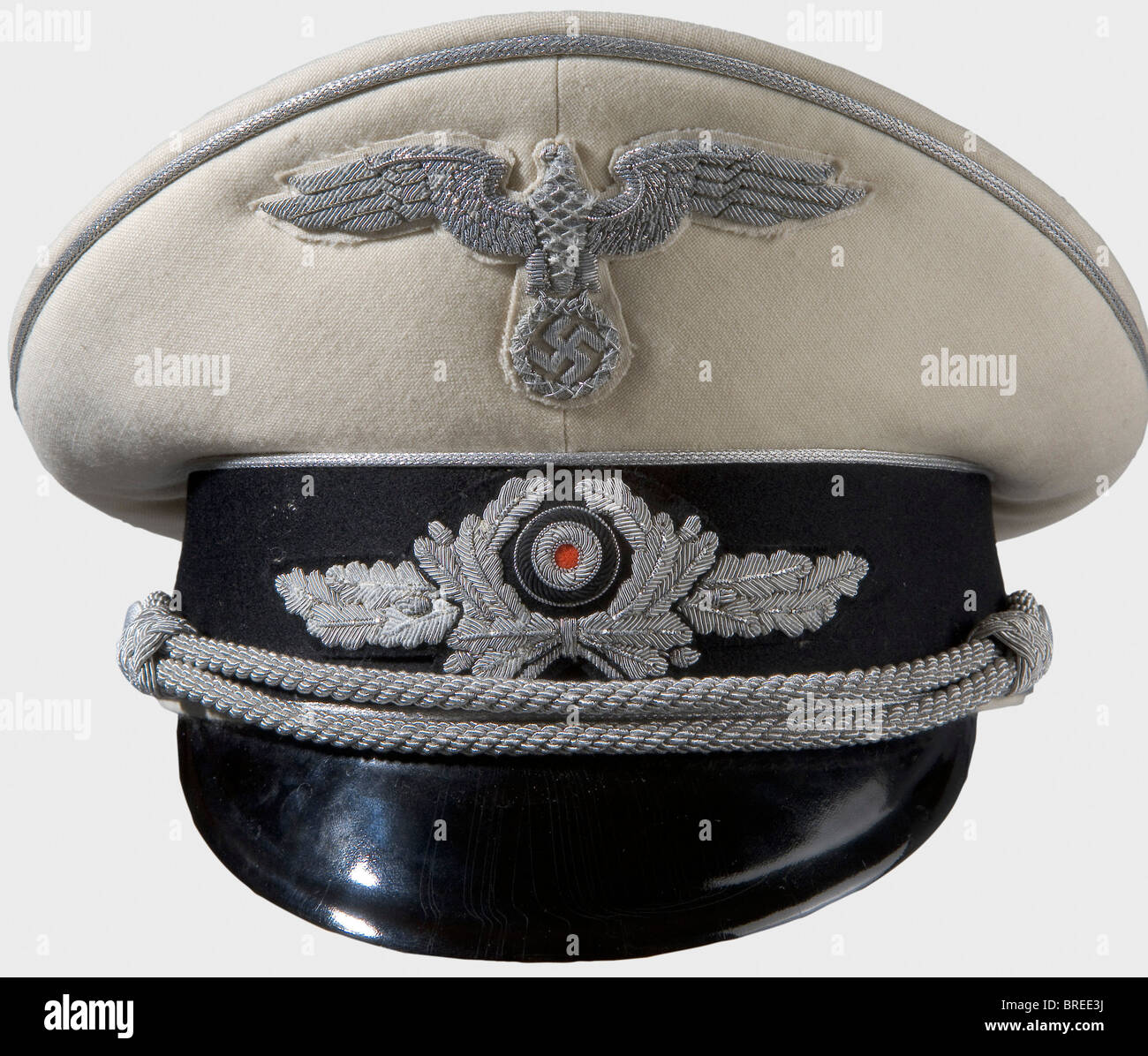 Franz von Papen (1879 - 1969), a summer service cap for the diplomat's uniform Fine, white linen with black cap band and silver piping, silver-embroidered party eagle on white backing, silver-embroidered cap wreath on black backing, and a silver cap cord. Cream-coloured silk lining with the von Papen family coat of arms on the inside label. Insignia are slightly oxidized. In 1932, Franz von Papen was appointed Reich's Chancellor by the Reich's President Paul von Hindenburg, during 1933 - 1934, he was vice-chancellor in Hitler's cabinet, as ambassador, he played, Stock Photo
