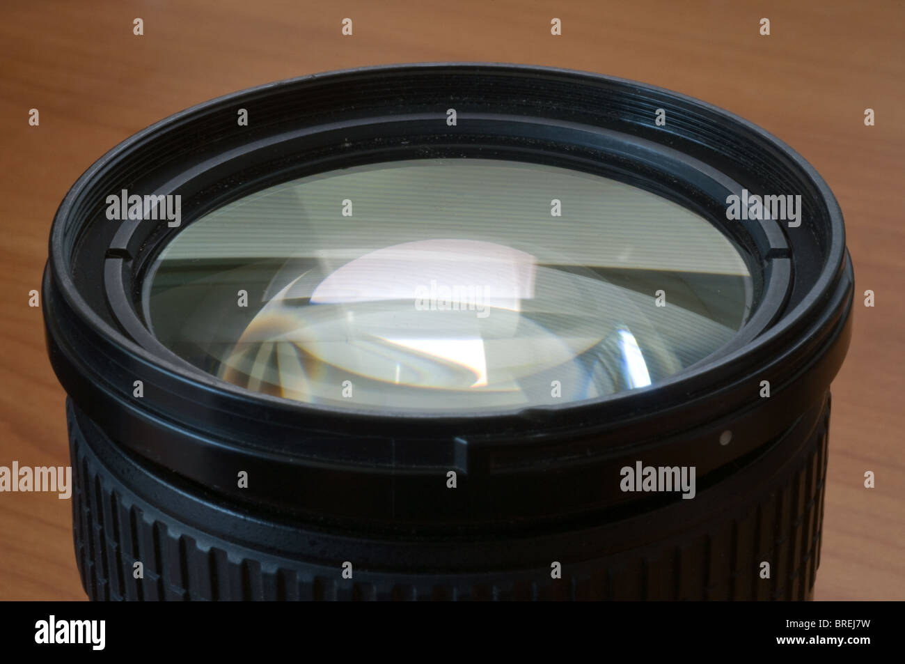 Relections on glass elements of a camera lens. Stock Photo