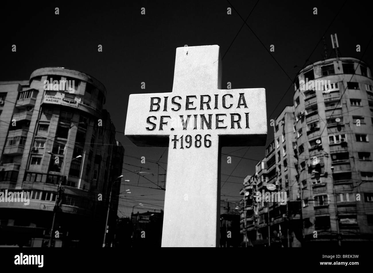 Romania, Bucharest. Memory cross for destroyed church Stock Photo