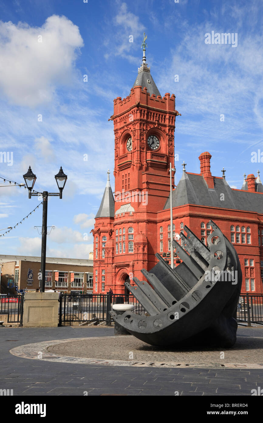 Merchant Seamen's war memorial and Pierhead building on the waterfront of the old docks. Cardiff Bay, Glamorgan, South Wales, UK, Britain. Stock Photo