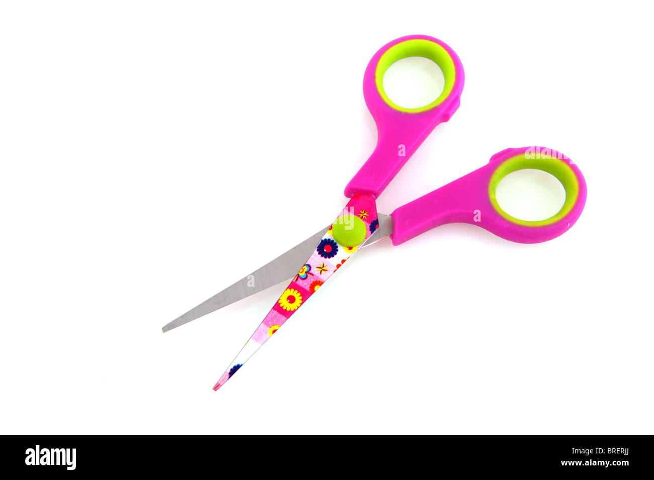 Child scissors with crocodile pattern isolated over white background