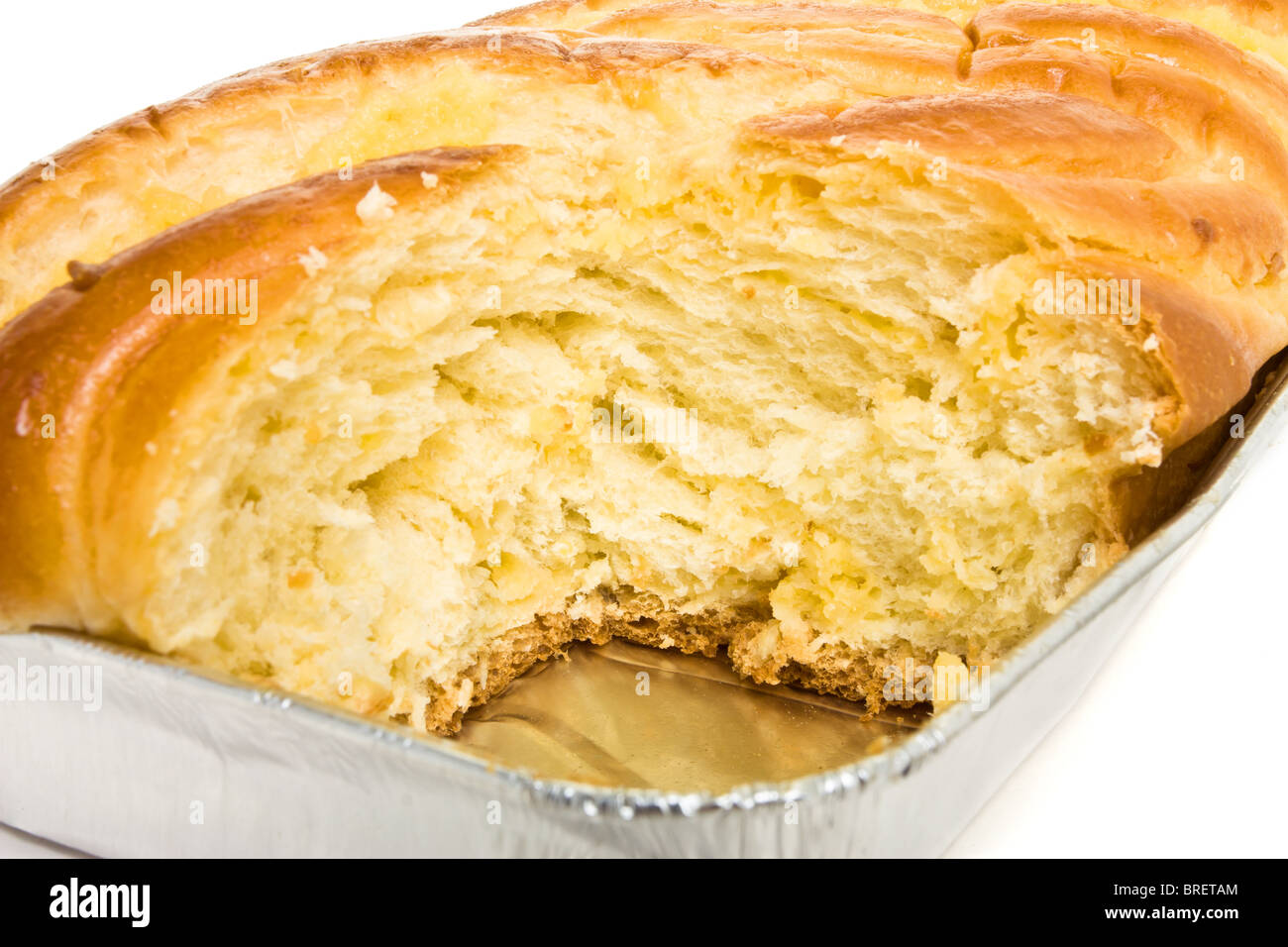 Brioche laced with creme custard from low perspective. Stock Photo