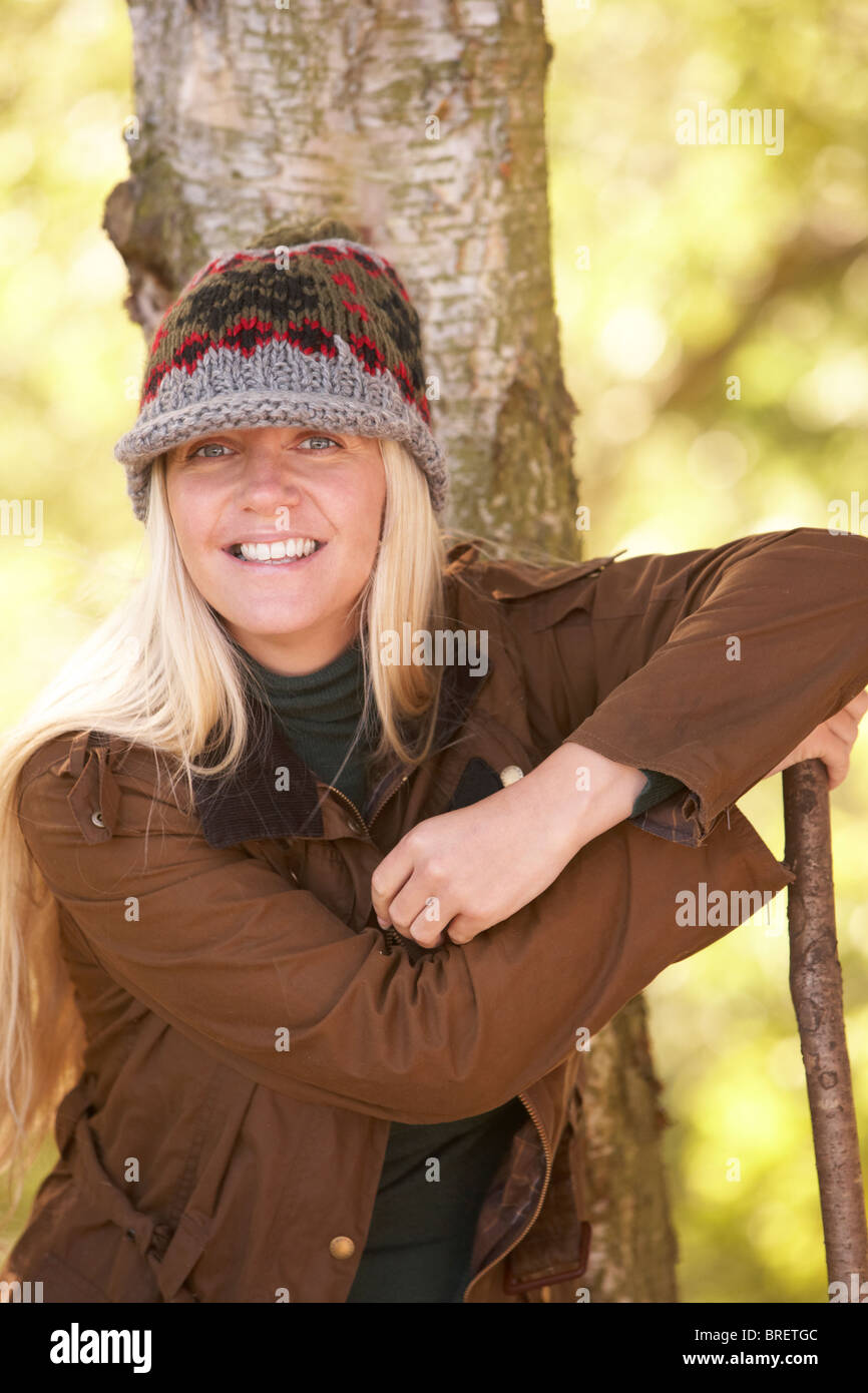 Woman carrying walking stick hi-res stock photography and images - Alamy