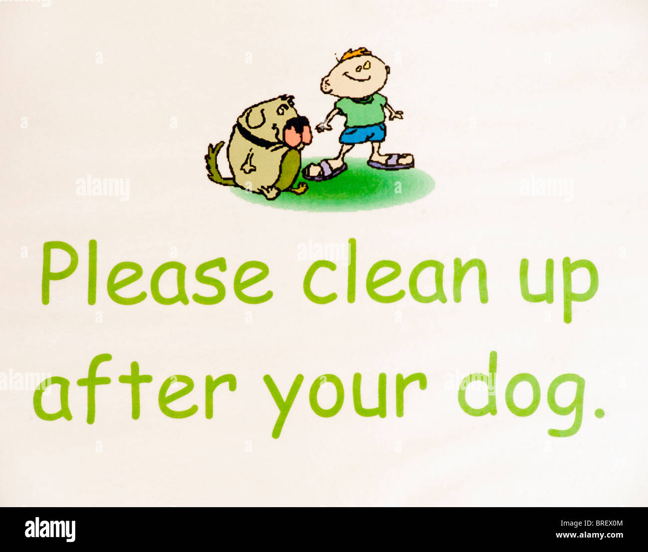 Notice displaying Please clean up after your dog Stock Photo Alamy