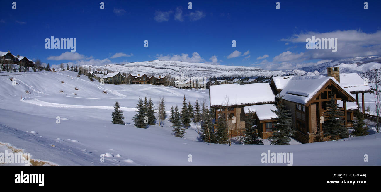 Panorama rolling hills, conifers and large homes, Cordillera, Colorado