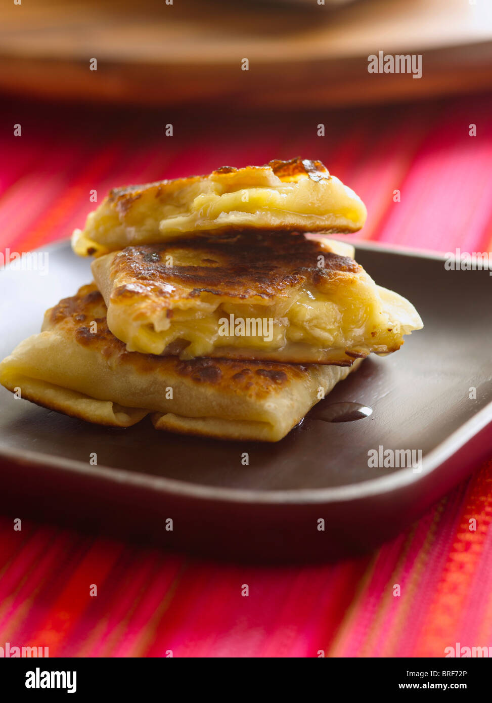 Roti with bananas and honey Stock Photo - Alamy