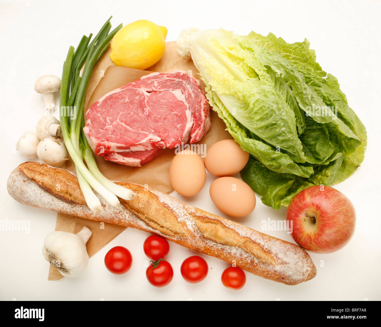Bread, meat and eggs with vegetables and fruit Stock Photo Alamy