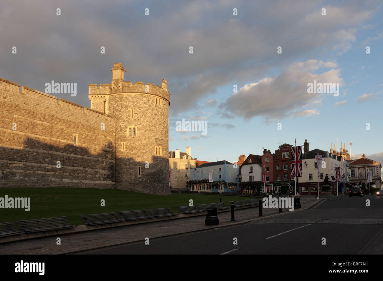 Outer wall of the oldest inhabited castle in the world,Windsor Castle viewed from Thames Street an hour before sunset. Stock Photo