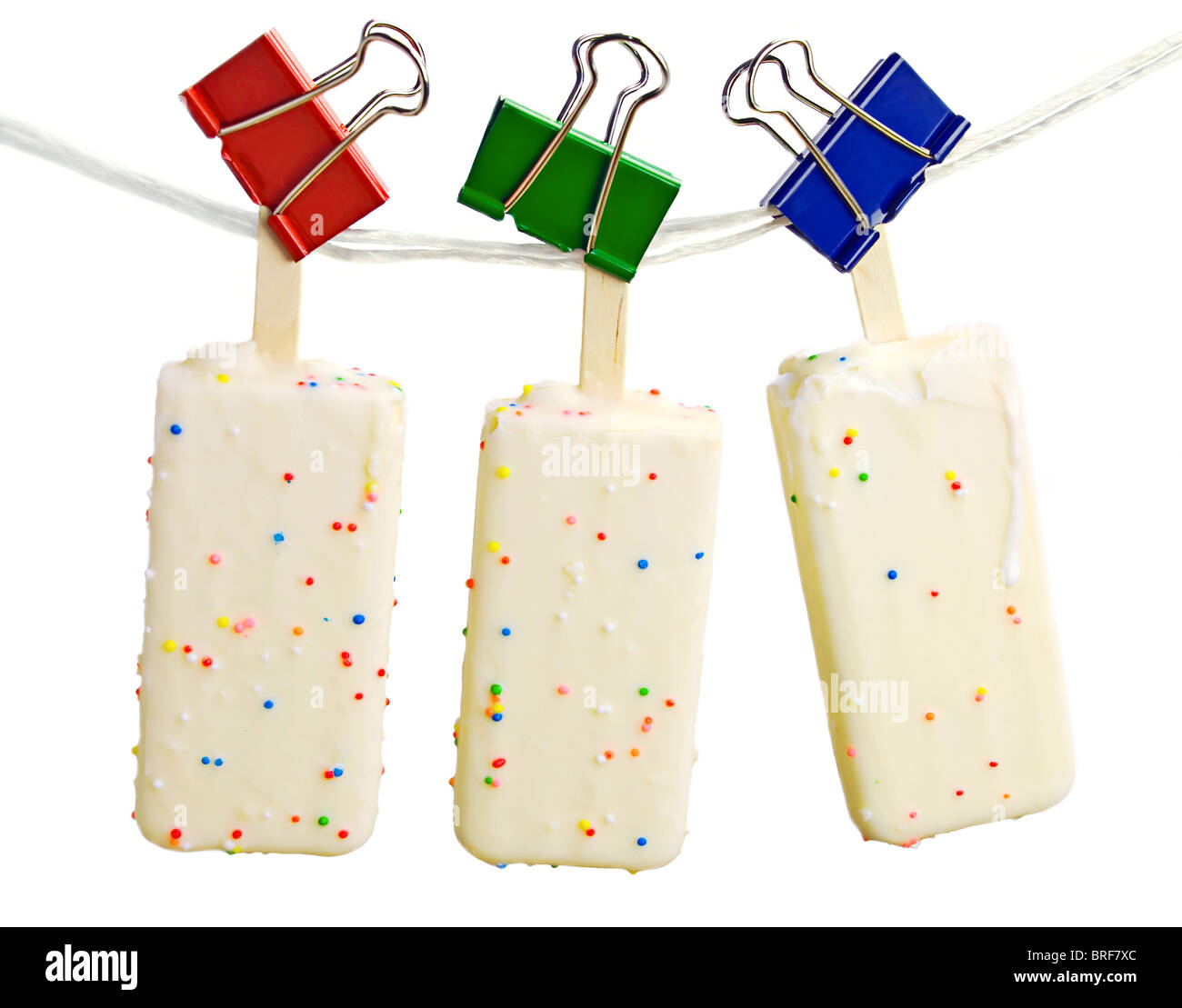 White ice cream hanging on rope Stock Photo - Alamy