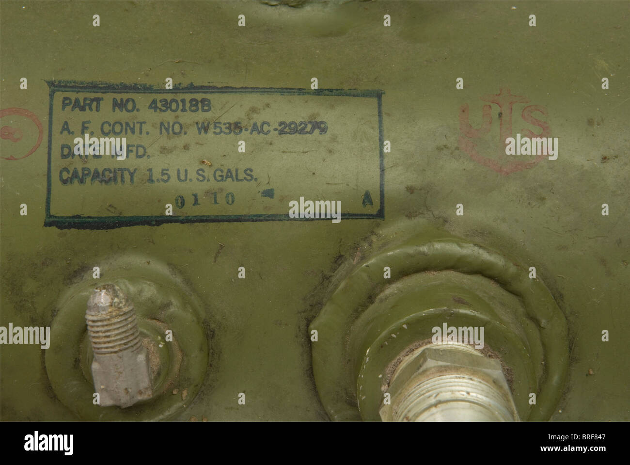 A US Air Force aircraft windshield, with integrated heating system, complete with metal