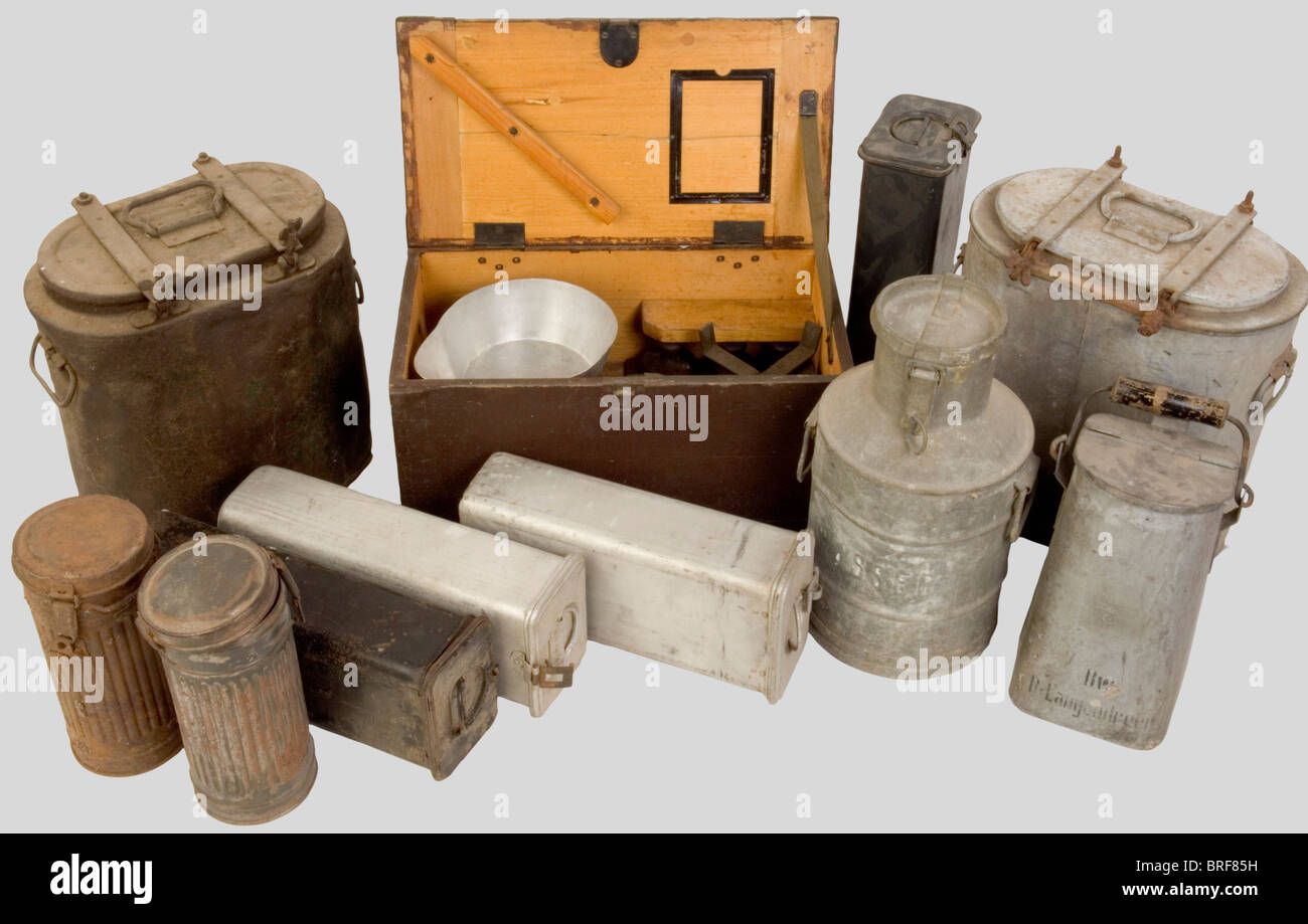 A set of cookware of the Wehrmacht, including a wooden case in feldgrau colour containing standard german army scales with two pans and some of the weights. Two metal canisters for transporting soup, 3 metal containers for coffee and one for tea, a water pot in grey metal, a coal bucket from the Deutsche Bahn, two gas masks cases (quite corroded)., historic, historical, 1930s, 1930s, 20th century, Wehrmacht, armed forces, army, NS, National Socialism, Nazism, Third Reich, German Reich, Germany, object, objects, stills, clipping, clippings, cut out, cut-out, cut, Stock Photo