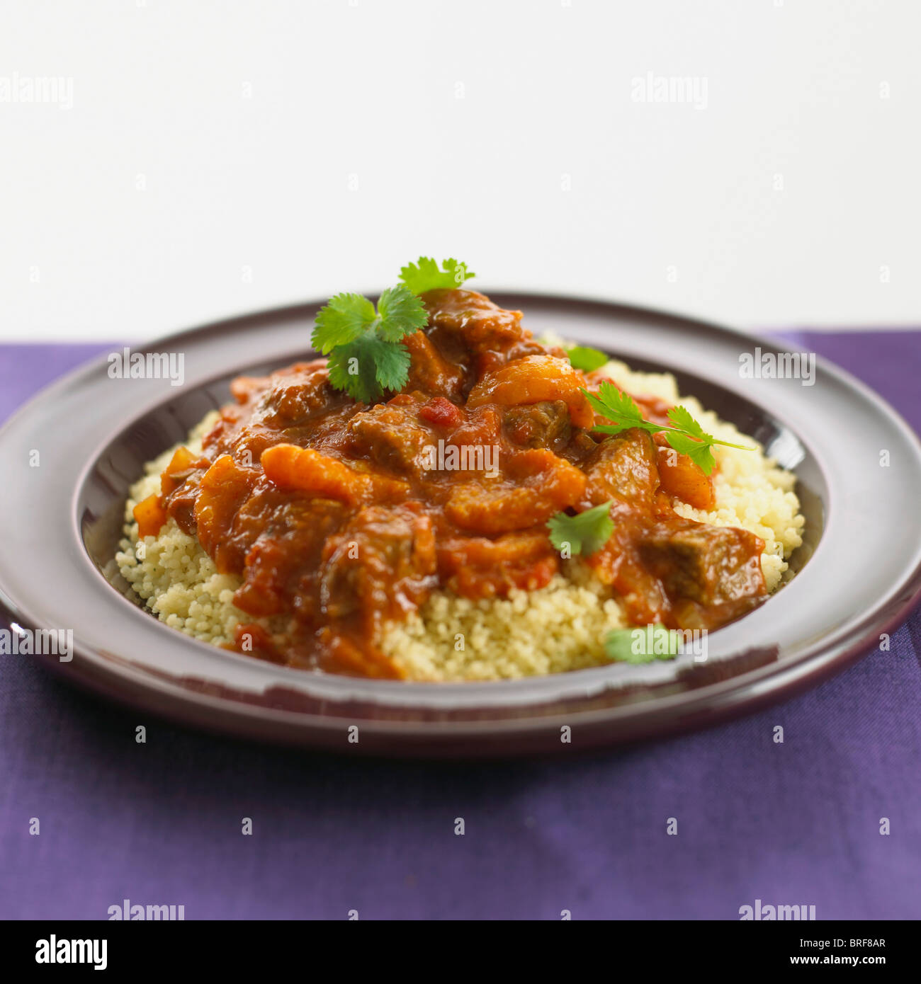 Moroccan lamb tagine with couscous, close-up Stock Photo