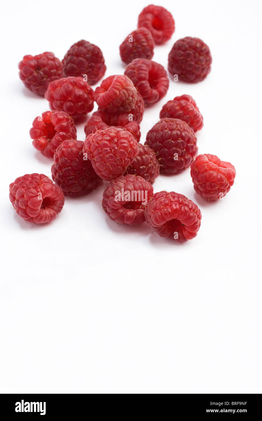 Heritage red raspberries on white background, close-up Stock Photo