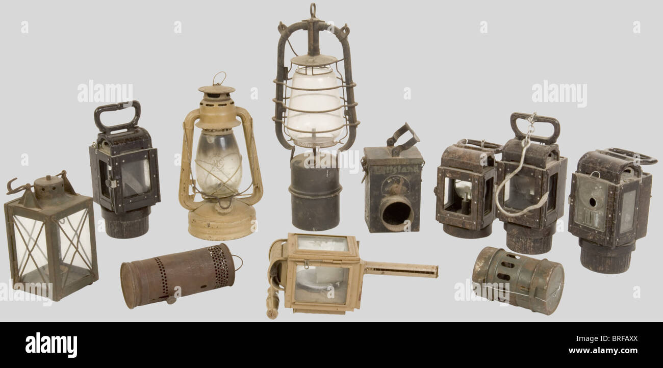 A group of storm lanterns and lamps, used by the German Army, including 4  in brown bakelite (including three complete with fuel cartridges and one  with protecting glass and cartridge missing), three