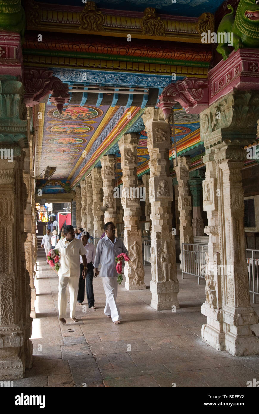 Pillared corridor around golden lotus tank in Sri Meenakshi temple, (Hindu;Saivite), Madurai, Tamil Nadu. Stock Photo