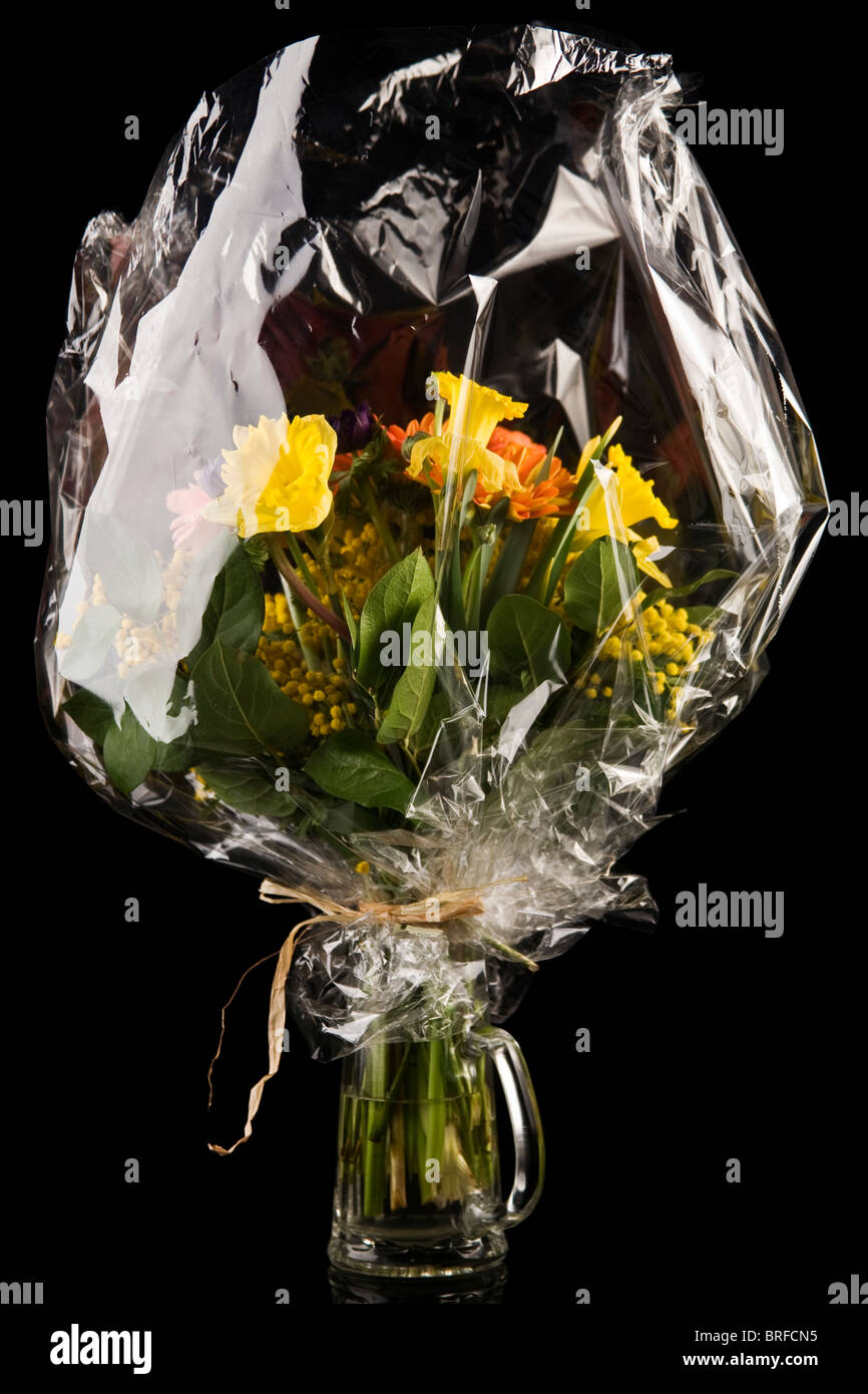 flower bouquet in cellophane packed Stock Photo Alamy