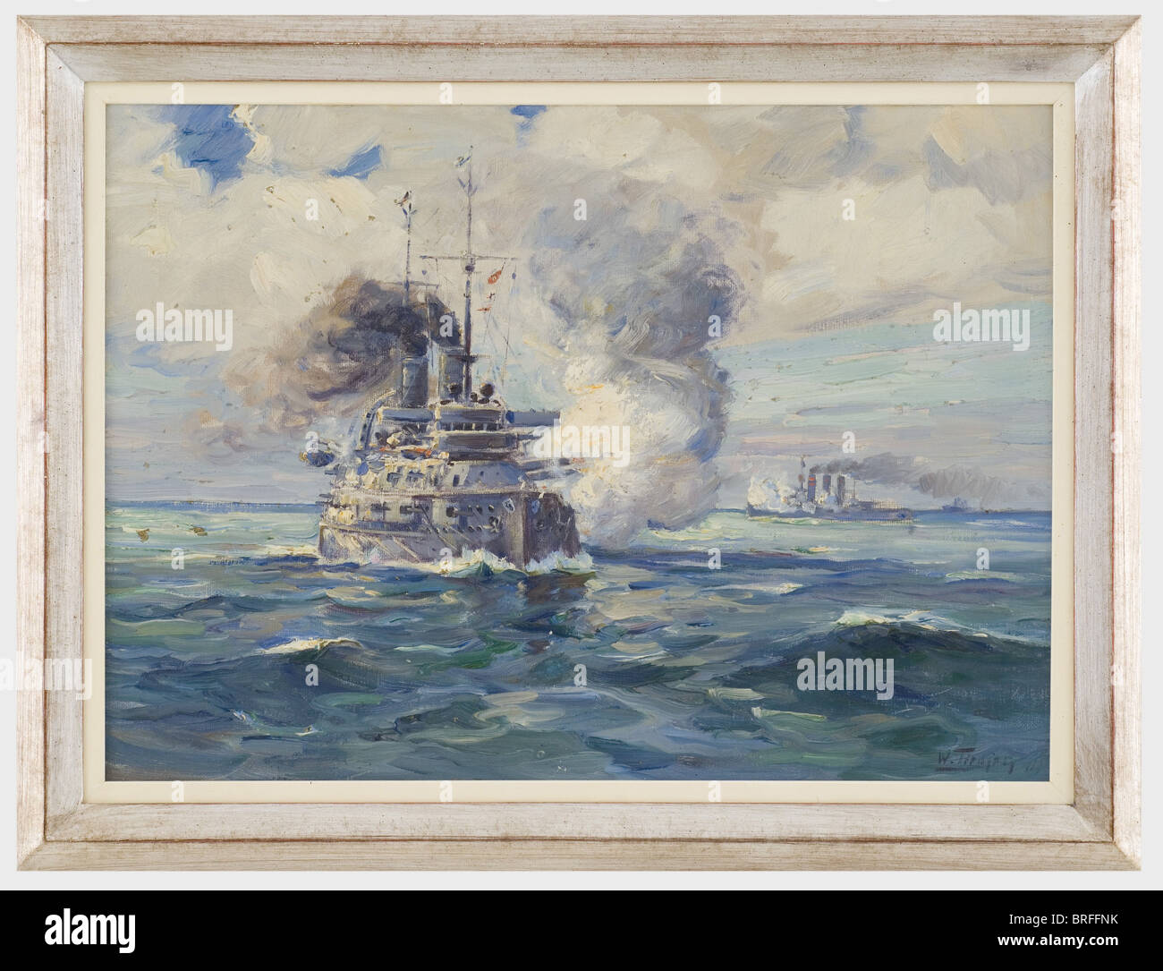 Willy Tiedjen (1881 - 1950) - the Battle of Jutland., Oil on canvas. In the foreground an Empire Class Battleship firing a volley at portside, in the background another battleship. One minute hole. Signed and illegibly dated on lower right. Silver profile frame. Picture size 70 x 50 cm, framed 83 x 63 cm. The Emperor Class was the third-largest class of German battleships, which was inspired by the British 'Dreadnought' and was the first to be powered by steam turbines. All ships of this class belonged to the third battleship squadron, took part in the Battle o, Stock Photo