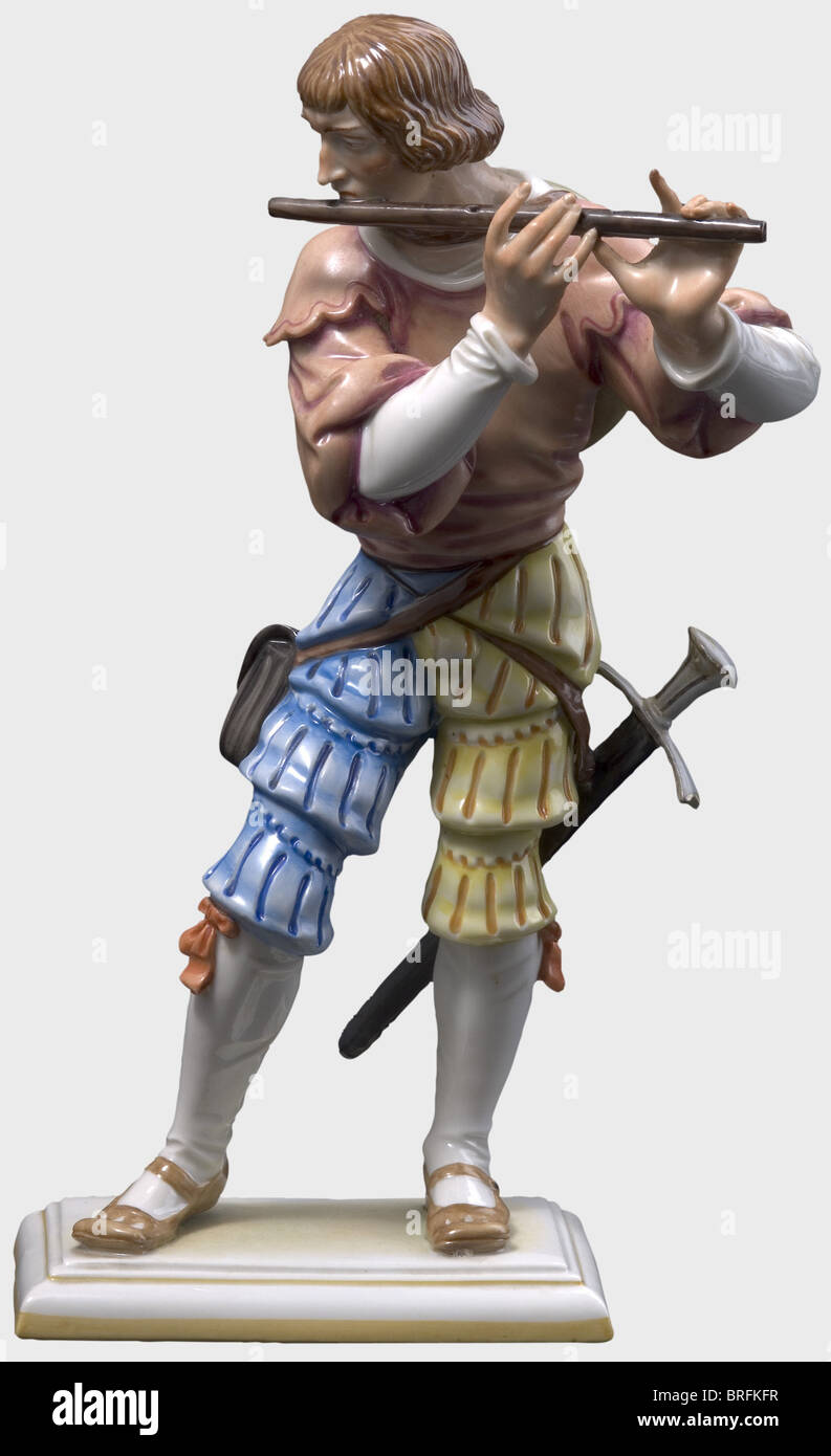 A 'Landsknecht' playing the flute.,A colour finished porcelain figure with the artist's inscription 'R. Förster',the model number '155',and the manufacturer's press mark on the bottom. Height 23.5 cm. Completely undamaged and unrestored. Richard Förster created the figure in 1943 along with other figures of 'Landsknechts' and soldiers. Cf. Hermann Historica,26th auction 1992,lot 5702(sold at 10,500 DM)and G. Huber,Die Porzellan-Manufaktur Allach-München GmbH,p. 199. Very rare figure. historic,historical,people,1930s,20th century,object,objects,s,Additional-Rights-Clearences-Not Available Stock Photo