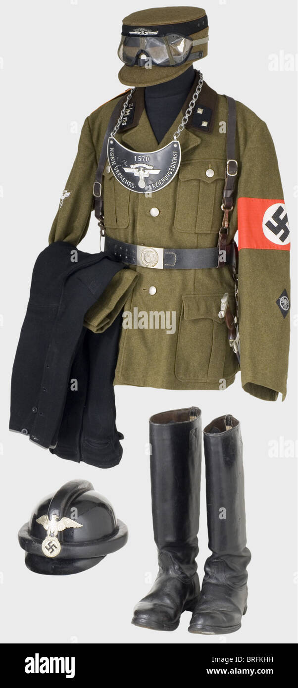 A uniform ensemble for a sergeant,of the 158th Motor Regiment in Colmar/Alsace. Black crash helmet,the fiberglass skull has padded protective bars,black leather ear flaps(one rivet torn out)and neck protector,light leather lining,and a silver heraldic eagle on the front. Size 57. Olive brown wool kepi with black cap band and light brown piping,woven silver heraldic eagle,black chin straps. Brown linen/oil cloth lining(damaged)with cardboard stiffening,RZM label,ersatz material sweatband. Tunic of olive brown wool with a dark brown collar,RZM label,Additional-Rights-Clearences-Not Available Stock Photo