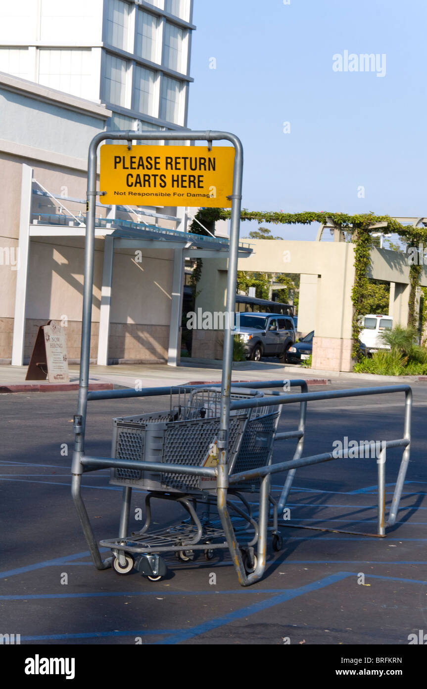 shopping cart at parking lot Stock Photo Alamy