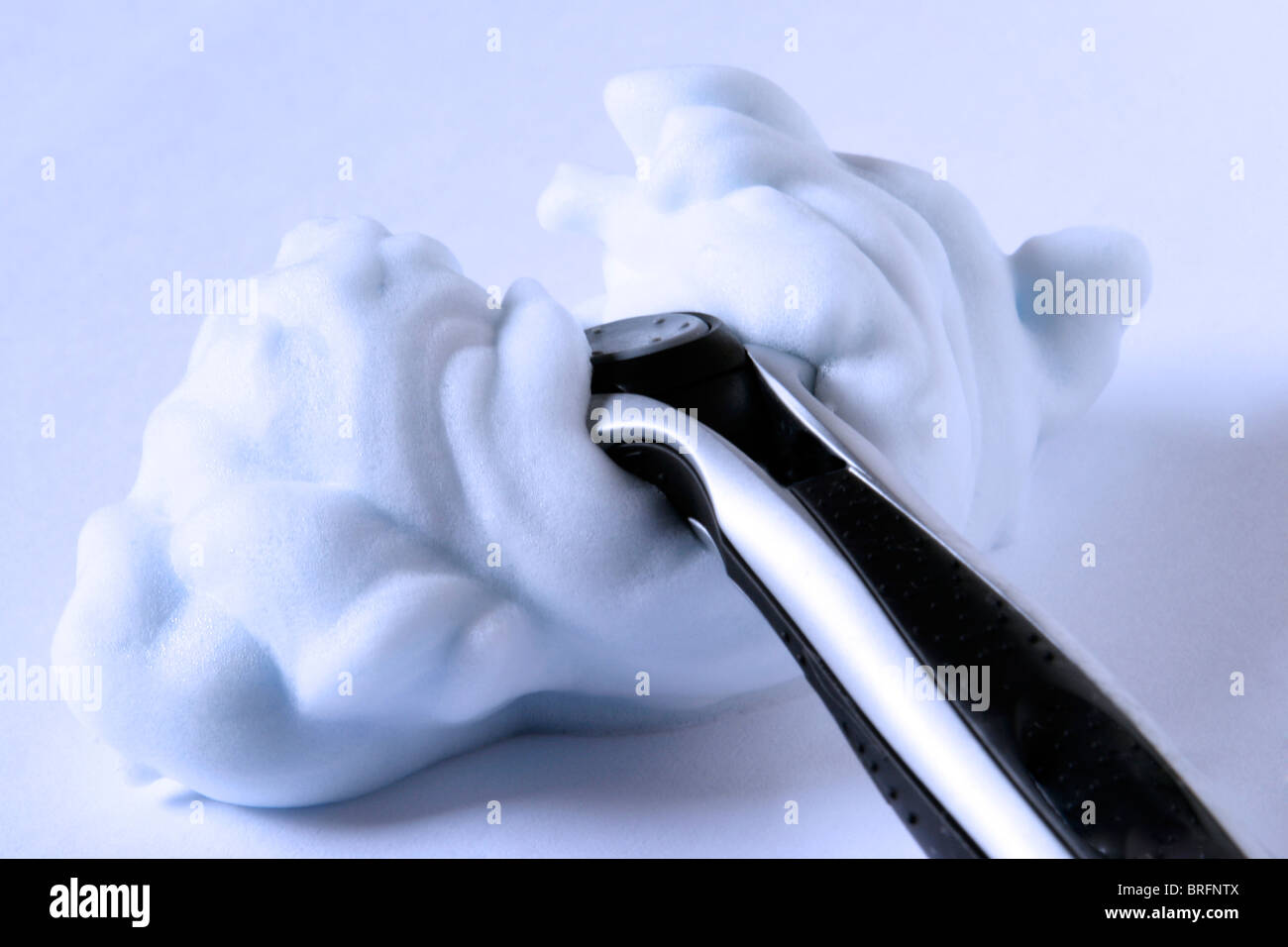 Razor with shaving cream Stock Photo Alamy