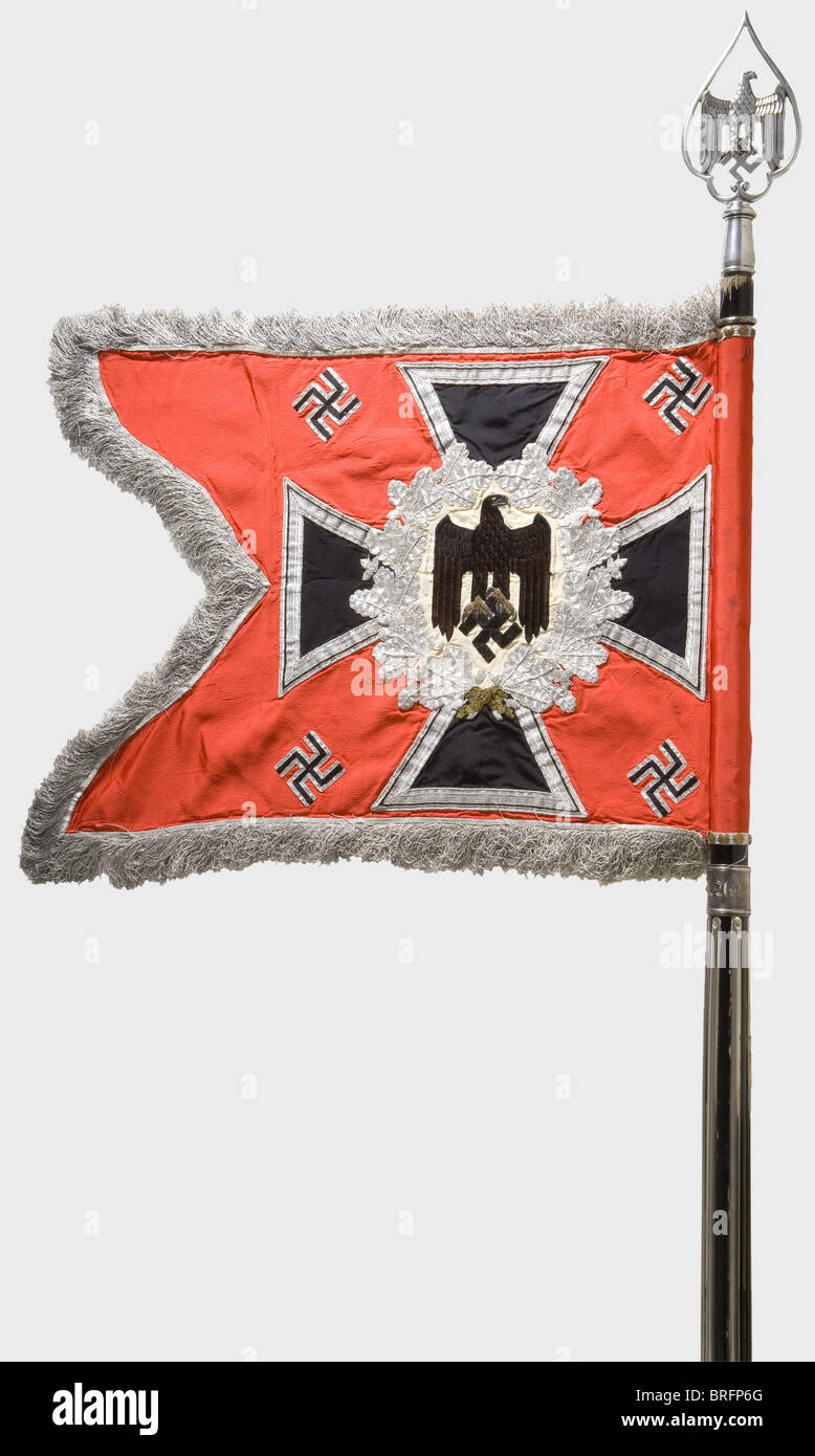 A standard for the 1st Battalion of the 71st Artillery Regiment.,Bright red silk cloth. Hand-embroidered black army eagle on both sides set off with brown feathers,and beak and claws in gold trim embroidery on a field of cream-coloured silk,surrounded by an embroidered silver oak leaf wreath on an i historic,historical,1930s,20th century,artillery,branch of service,branches of service,armed service,armed services,object,objects,clipping,cut out,cut-out,cut-outs,stills,NS,National Socialism,Nazism,Third Reich,German Reich,emblem,emblems,,Additional-Rights-Clearences-Not Available Stock Photo