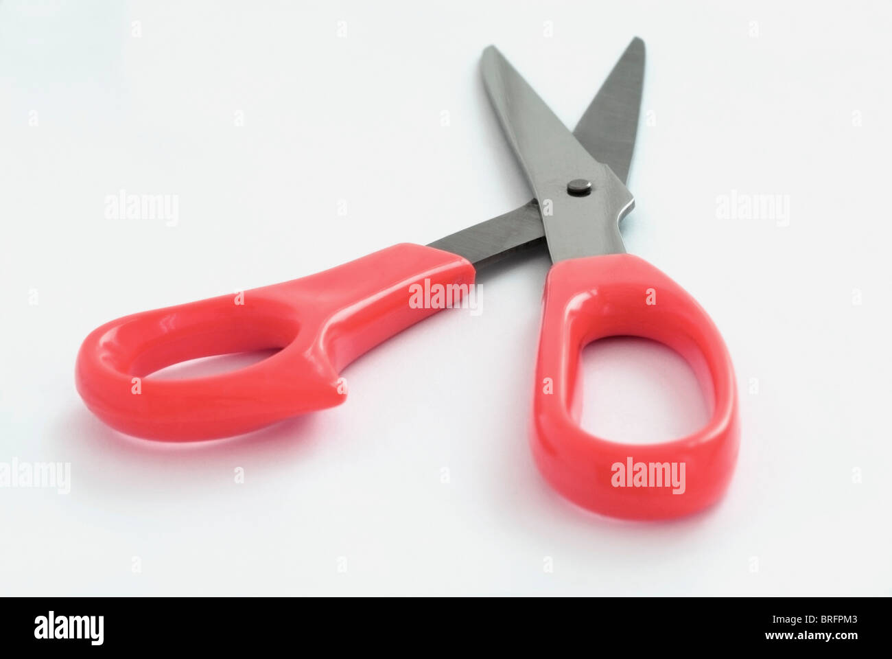 Red Handle Scissors Stock Photo