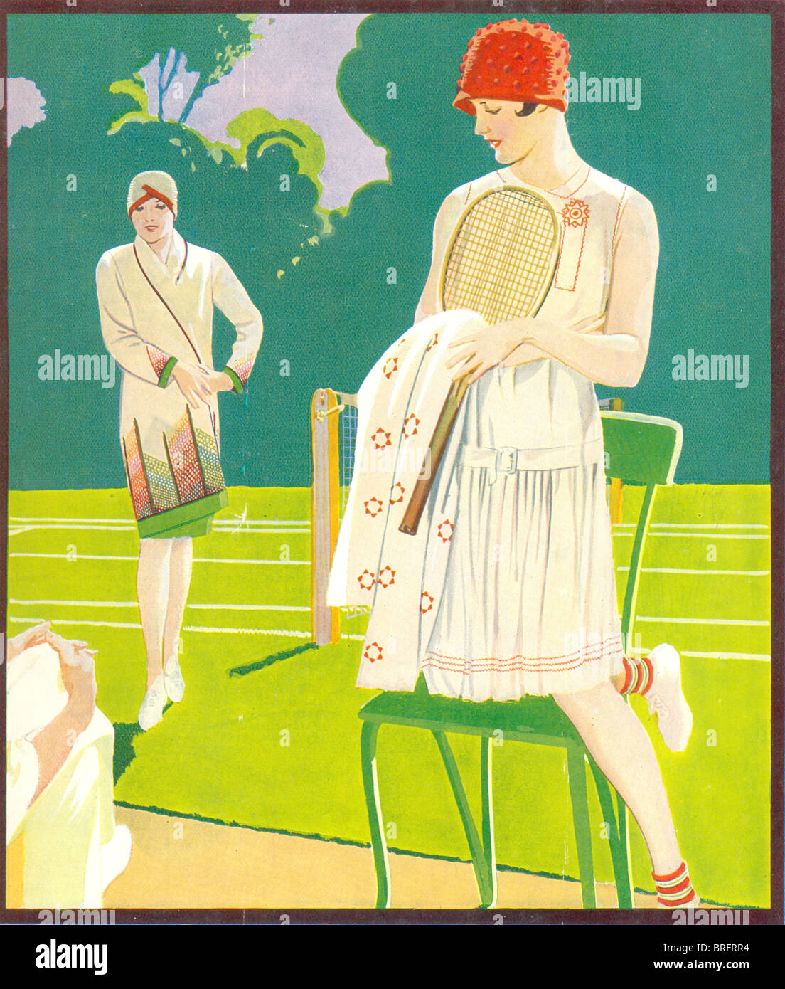 Front cover for The Needlewoman showing two fashionable ladies about to play tennis May 1928 Stock Photo