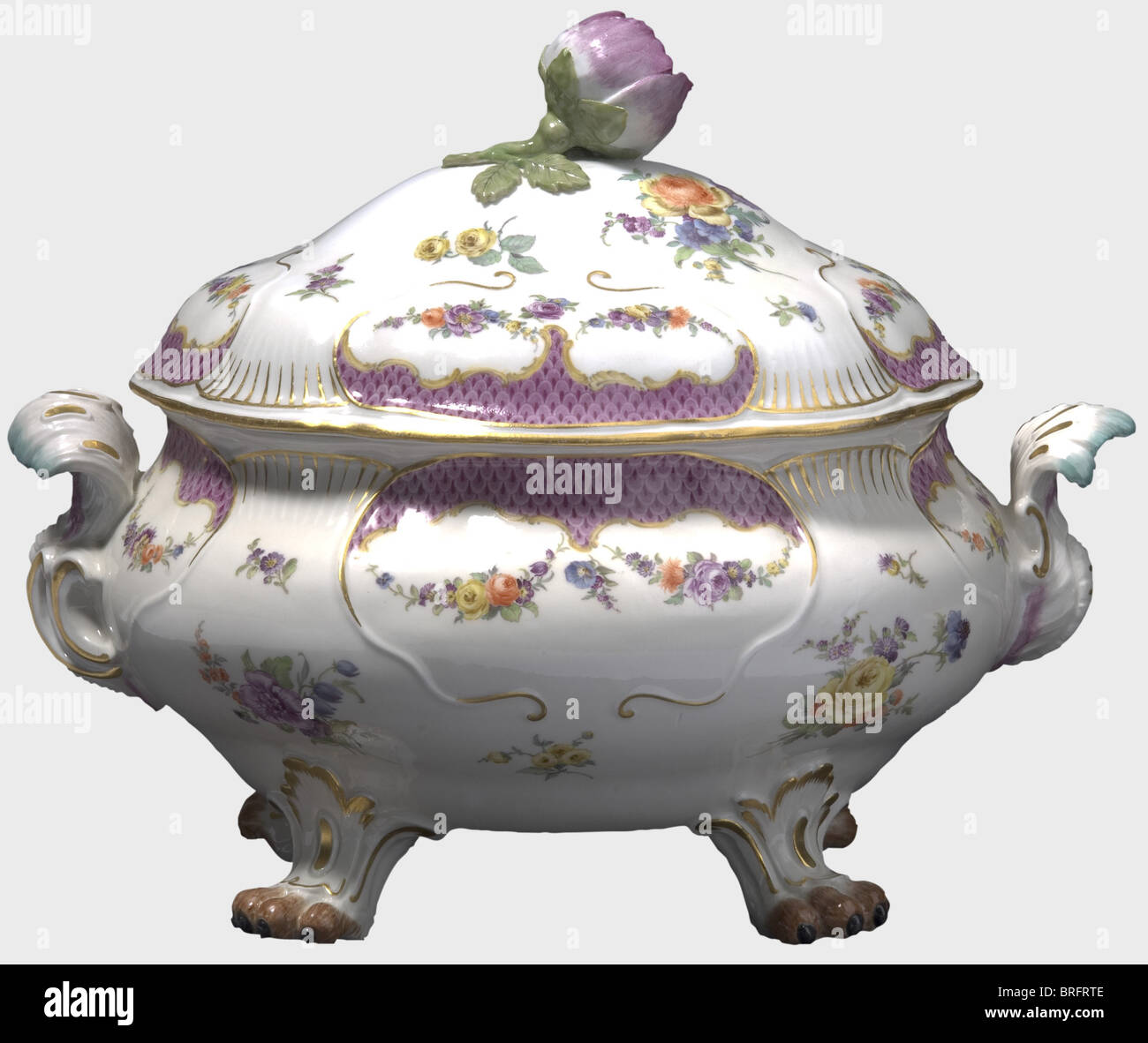 Friedrich II - Count Kurt Christoph von Schwerin(1684 - 1757),a covered porcelain terrine,Meissen,circa 1746/50. Rococo terrine on four animal paws,with rocaille handles,lid handle in the shape of a rose,hand-painted decorative flowers in colour,and a surrounding purple-coloured,scalloped rim. The service was a gift from Frederick the Great to his Field Marshal Schwerin. The occasion is so far unknown,however,it may perhaps be dated to 1754. Underglaze sword mark on the bottom. 30 x 26 x 22 cm. historic,historical,18th century,Prussian,Prussia,G,Additional-Rights-Clearences-Not Available Stock Photo