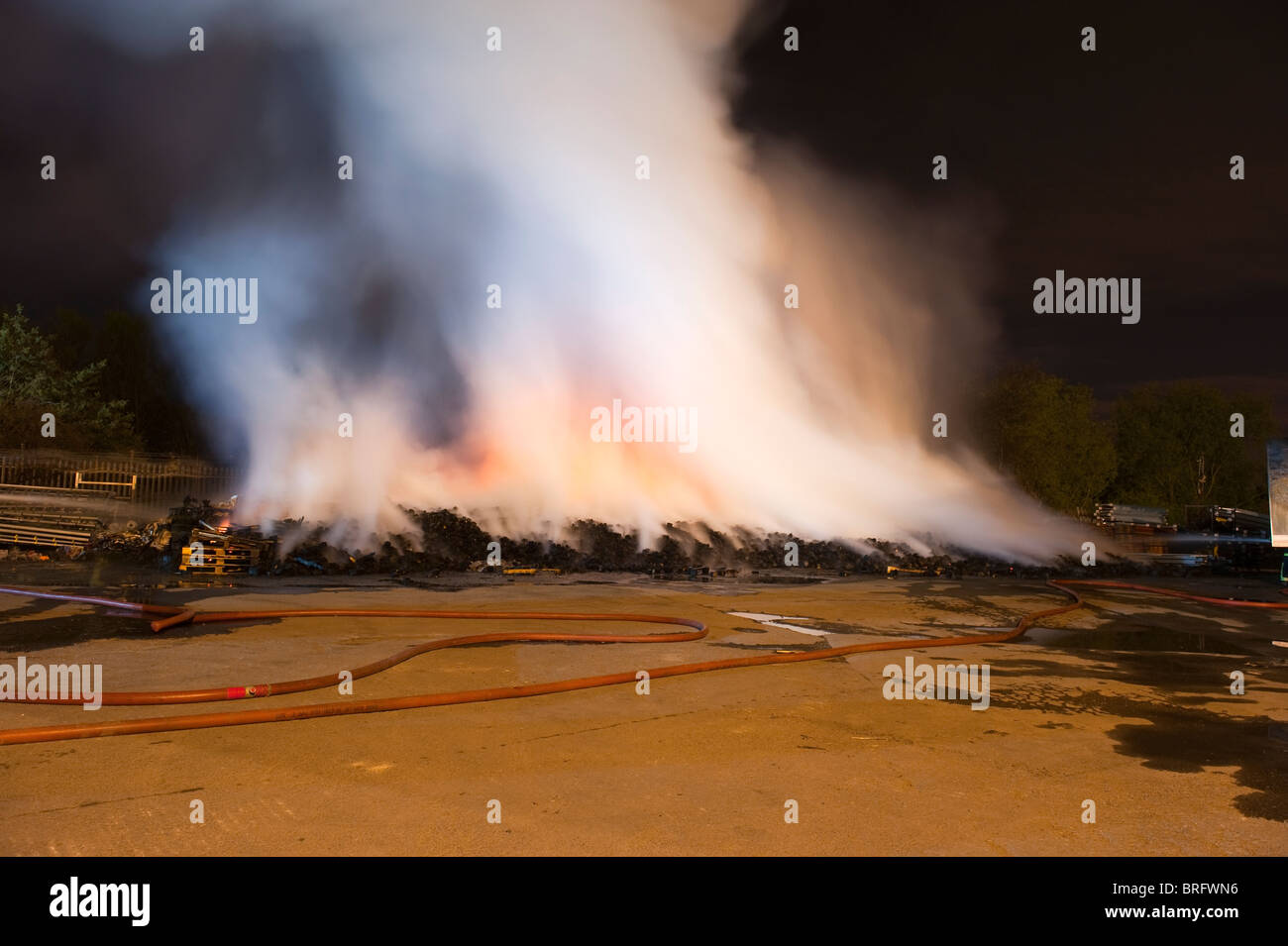 Fire and smoke at night at pallet yard Stock Photo Alamy