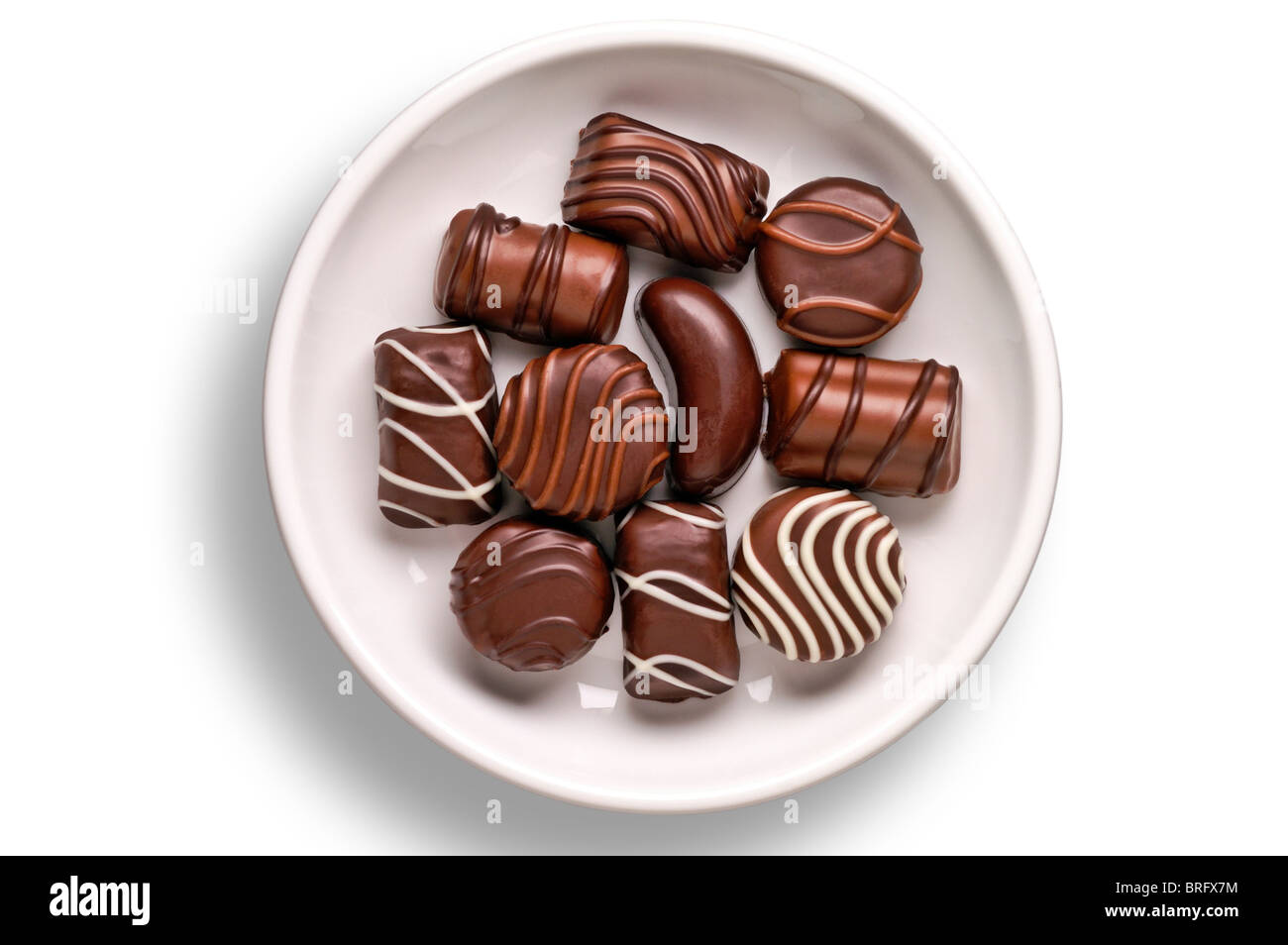 Chocolate candies in a dish with clipping path Stock Photo