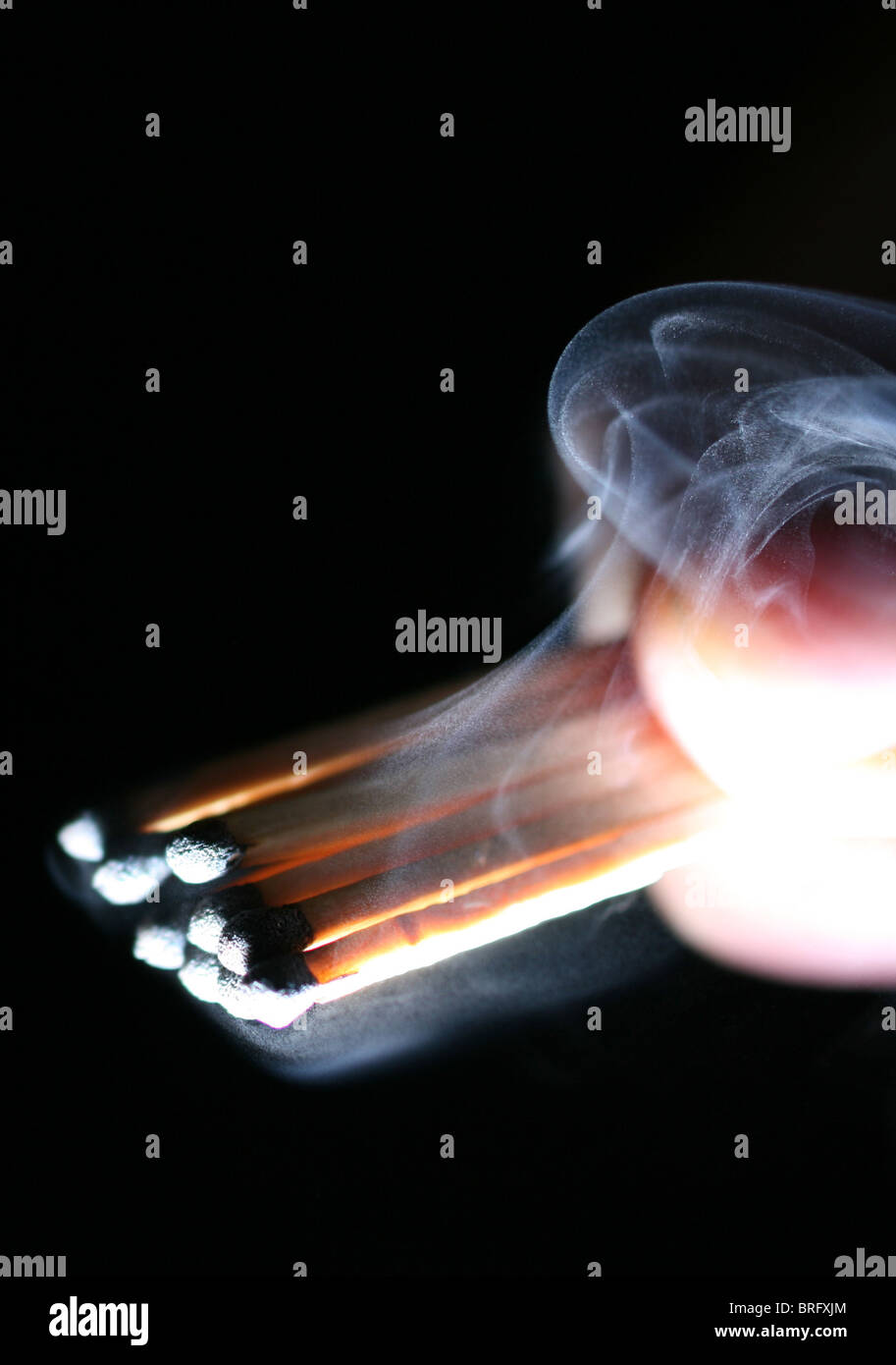 Head is flaring showing flame, on black background Stock Photo