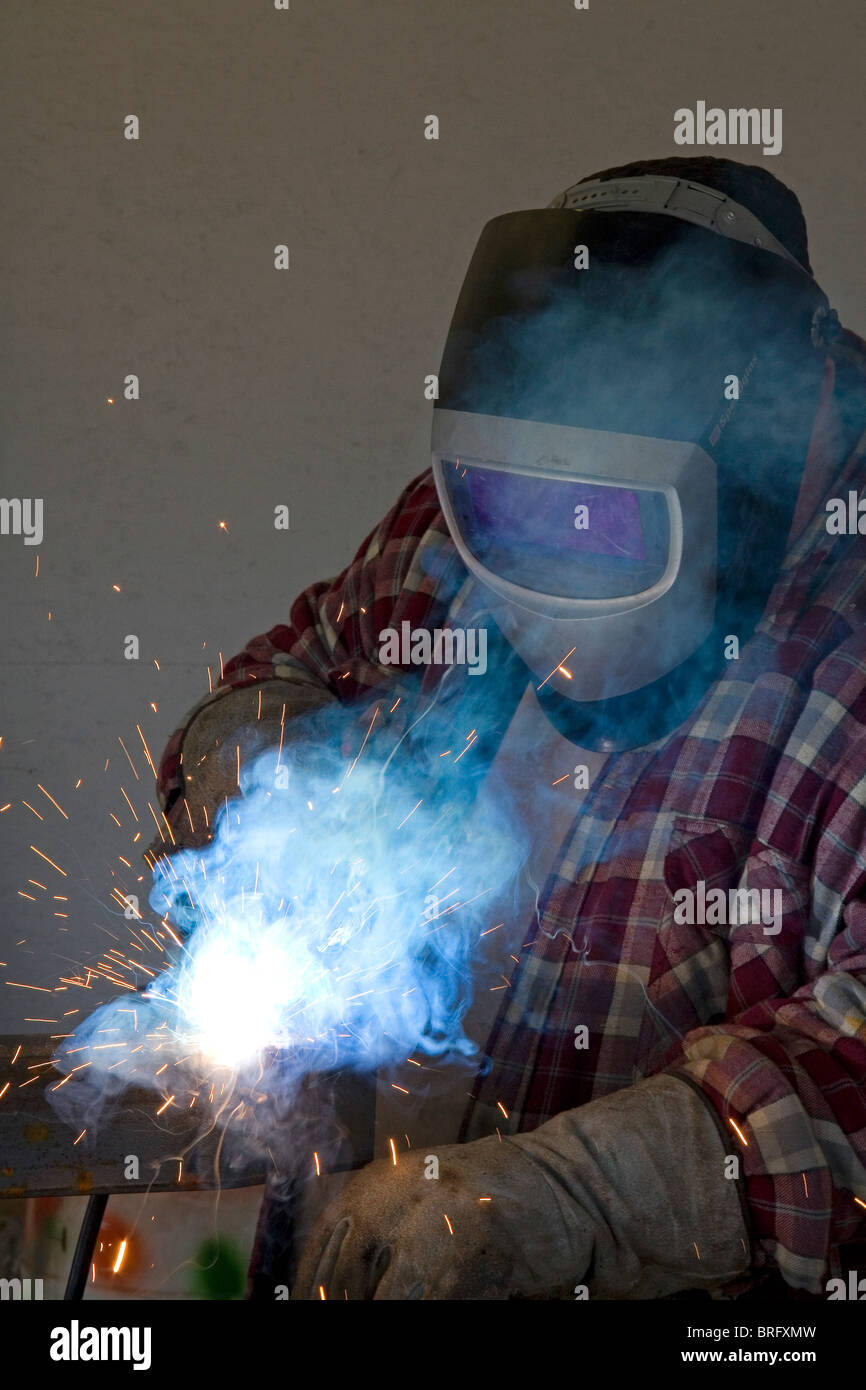 Shielded metal arc welding. Stock Photo