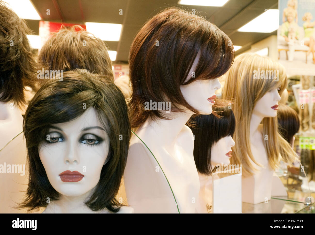 Mannequins wearing wigs in a wig store shop window, Las Vegas Mall, Las Vegas USA Stock Photo