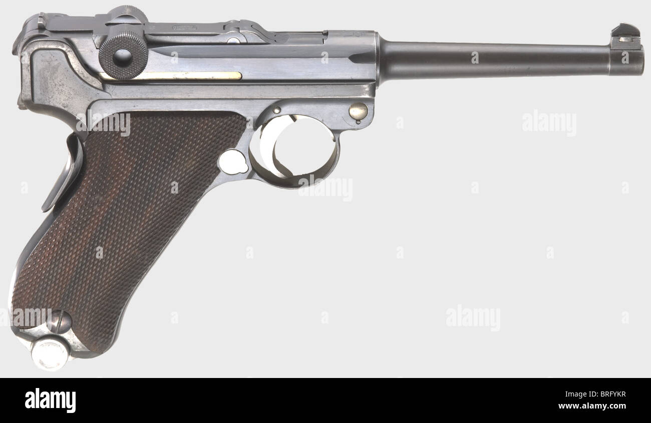 A Parabellum Mauser mod.06/34,'Mauser-Banner GNR',calibre 7.65 Parabellum,no.1992v.Matching numbers.Almost bright bore,barrel length 120 mm.Proof mark: double crown/'U'.Grip safety.On the receiver intricate monogram: 'GNR' - symbolic for Guardia Nacional Republicana.Small banner on front toggle link.Extractor marked 'Carregada',safety labelled 'Seguranca'.Original finish with minimal wear marks on trigger plate and edges.Bluing on barrel presumably slightly touched up.Small parts blue and yellow.Faultless dark brown walnut grip panels.Subtle ,Additional-Rights-Clearences-Not Available Stock Photo