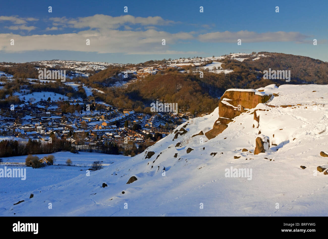 View from Black Rocks towards Cromford village in the Derbyshire Dales in the Peak District England after a fall of heavy snow Stock Photo