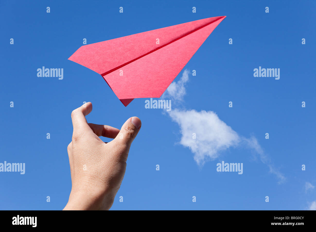 Red Paper Airplane and blue sky Stock Photo - Alamy