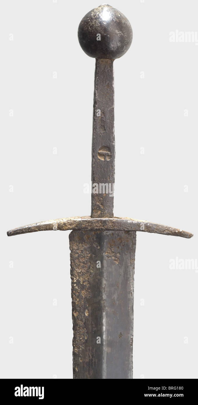 A French dagger,14th century,Long,double-edged blade with ridges on both sides and stamped decoration on the ridges. Slightly curved quillons with marks stamped on the rectangular tapered tang. Round iron pommel,in cross section a pointed oval. The entire length is unusually well preserved for an underwater discovery,the point is slightly corroded and it has a black patina. Length 59 cm. Cf. Müller/Kölling,Europäische Hieb- und Stichwaffen,p. 177,No. 59.,historic,historical,14th century,dagger,daggers,thrusting,thrustings,baton,weapon,arms,we,Additional-Rights-Clearences-Not Available Stock Photo