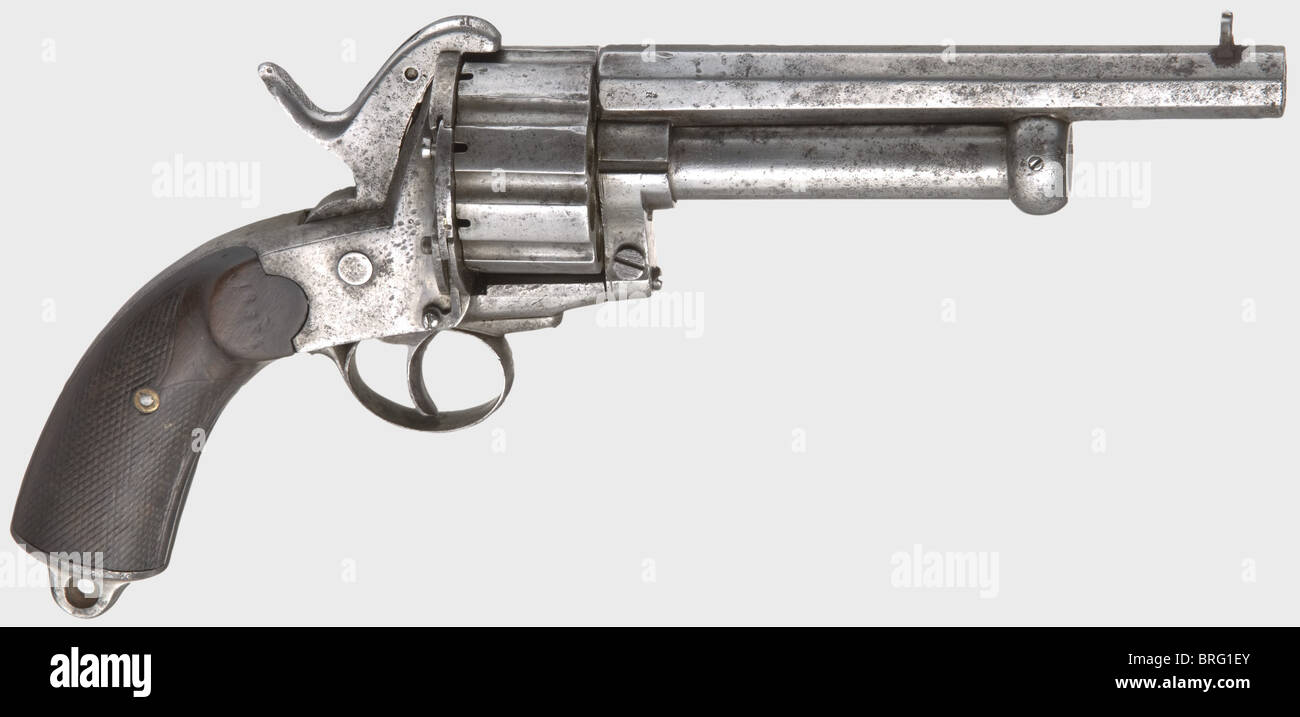 A Le Mat action pin-fire revolver,circa 1865.In 11 mm Lefaucheux and 15.4 mm calibres.Serial number 18334.Octagonal bullet barrel above a round shot barrel with percussion ignition.Stamped '15.4' on the bottom.Nine-shot,grooved cylinder.Hammer with a movable nose to fire the percussion shot barrel.Firing pin(added later?)for centre fire ammunition.Checkered wooden grip panels.Metal surfaces are slightly pitted in places.Hammer spring is fatigued.Length 33 cm.Erwerbsscheinpflichtig.historic,historical,19th century,civil handgun,civil handgun,Additional-Rights-Clearences-Not Available Stock Photo