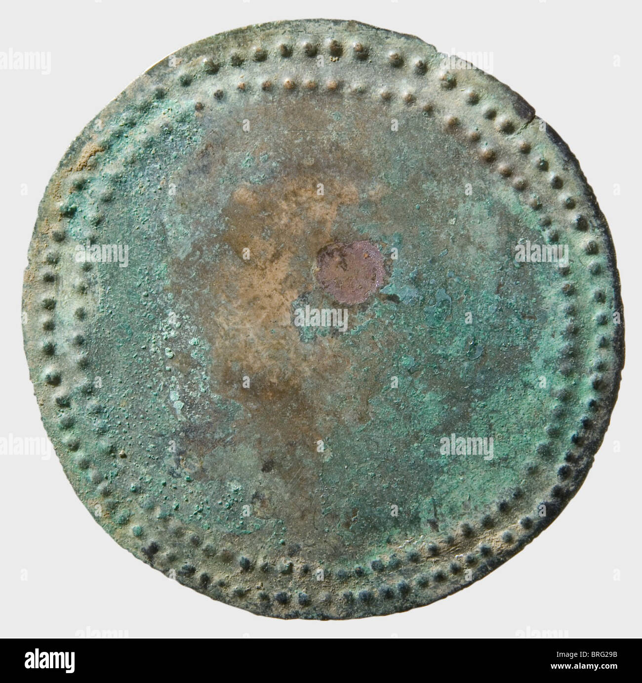A set of Central European shield fittings,Bronze Age,circa 1200 B.C.Bronze  with green patina.Complete set of different boss-shaped mountings for a  round shield of wood or leather.The central umbo is surrounded with three