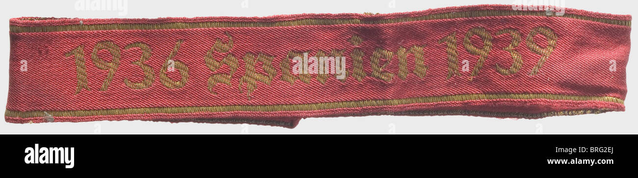 A '1936 Spanien 1939' sleeve band.,Red cloth with gold machine-woven lettering. Length 38.5 cm. In beautiful condition with signs of actual wear. Included are four intra-Spain envelopes addressed to a dried fruit company. An extremely rare sleeve band,awarded in 1939 to units that participated in the Spanish Civil War. historic,historical,1930s,20th century,Wehrmacht,armed forces,unit,units,troop,troops,NS,National Socialism,Nazism,Third Reich,German Reich,military,militaria,National Socialist,Nazi,Nazi period,object,objects,stills,clip,Additional-Rights-Clearences-Not Available Stock Photo