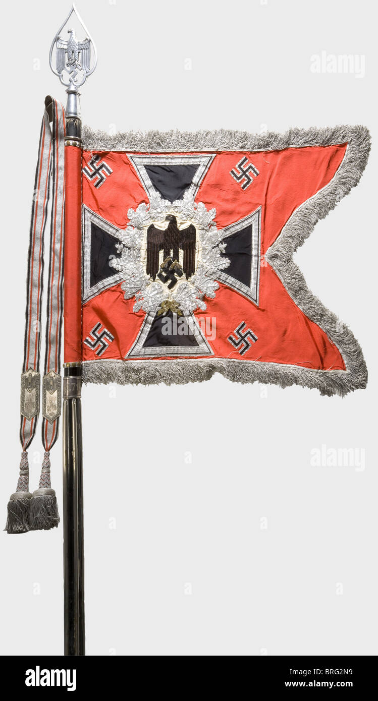 A standard for the 1st Battalion of the 71st Artillery Regiment.,Bright red silk cloth. Hand-embroidered black army eagle on both sides set off with brown feathers,and beak and claws in gold trim embroidery on a field of cream-coloured silk,surrounded by an embroidered silver oak leaf wreath on an i historic,historical,1930s,20th century,artillery,branch of service,branches of service,armed service,armed services,object,objects,clipping,cut out,cut-out,cut-outs,stills,NS,National Socialism,Nazism,Third Reich,German Reich,emblem,emblems,,Additional-Rights-Clearences-Not Available Stock Photo