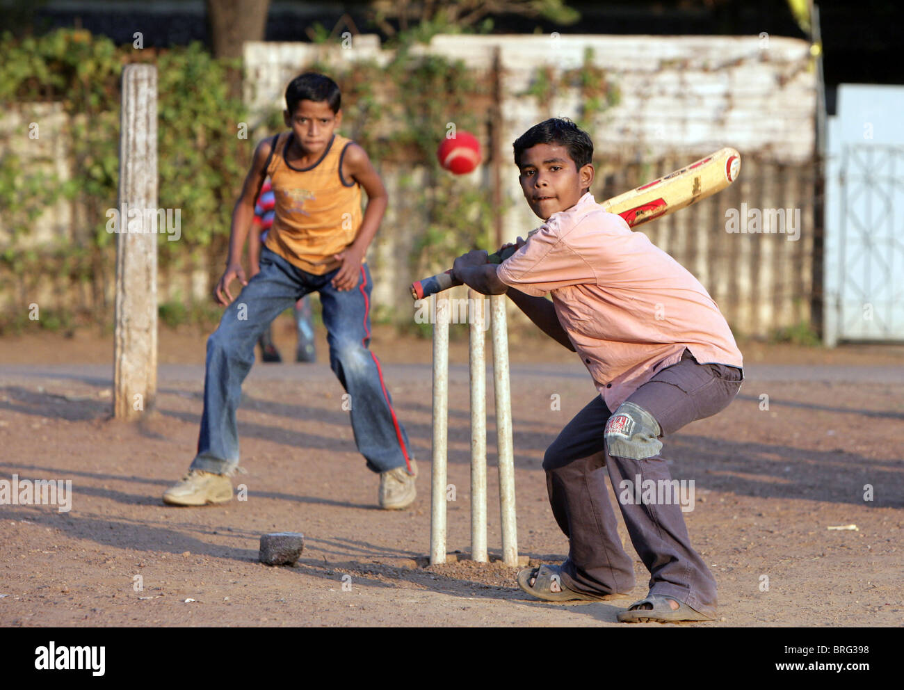 Boys playing cricket in Katni, Madhya Pradesh state, India Stock Photo